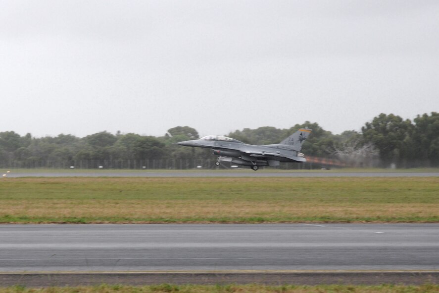 On February 21, 2011, an F-16 D aircraft from the 132nd Fighter Wing (132FW), Des Moines, Iowa, launches from the runway of the Williamtown Royal Australian Air Force (RAAF) Base, Australia, marking this launch as the first flight in history of 132FW F-16 aircraft from Australia.  The 132FW is conducting Dissimilar Air Combat Training(DACT) mission "Sentry Down Under" with the RAAF F-18's.  (US Air Force photo/Staff Sgt. Linda E. Kephart)(Released)   