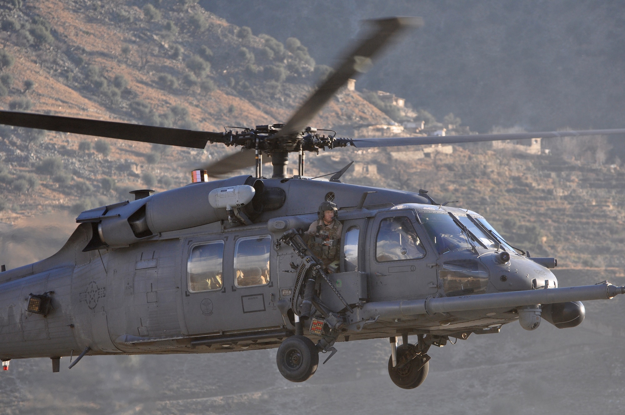 An HH-60G Pave Hawk assigned to the 83rd Expeditionary Rescue Squadron at Bagram Airfield, Afghanistan, arrives at a remote forward operating base in Afghanistan's Kunar province. The squadron members occasionally reposition personnel and aircraft to FOBs to provide casualty evacuation support to planned ground operations. (U.S. Air Force photo/Capt. Erick Saks)
