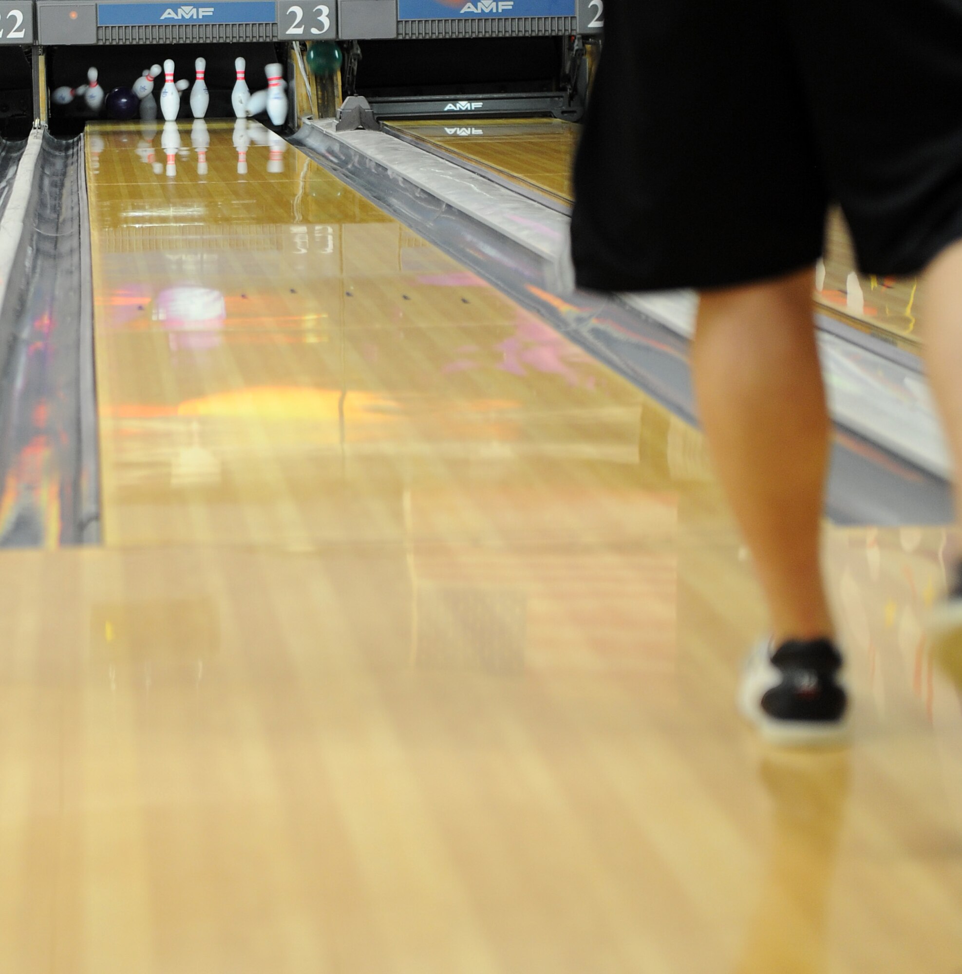 Staff Sgt. Justin Ellrich, 375th Comptroller Squadron financial services supervisor, picks up a spare at Stars and Strikes Bowling Center Feb 18, 2011, at Scott Air Force Base, Ill.  In addition to bowling, members of Wing Staff listened to briefings aabout deployments, physical fitness, and resilency. (U.S. Air Force photo/ Airman 1st Class Divine Cox)