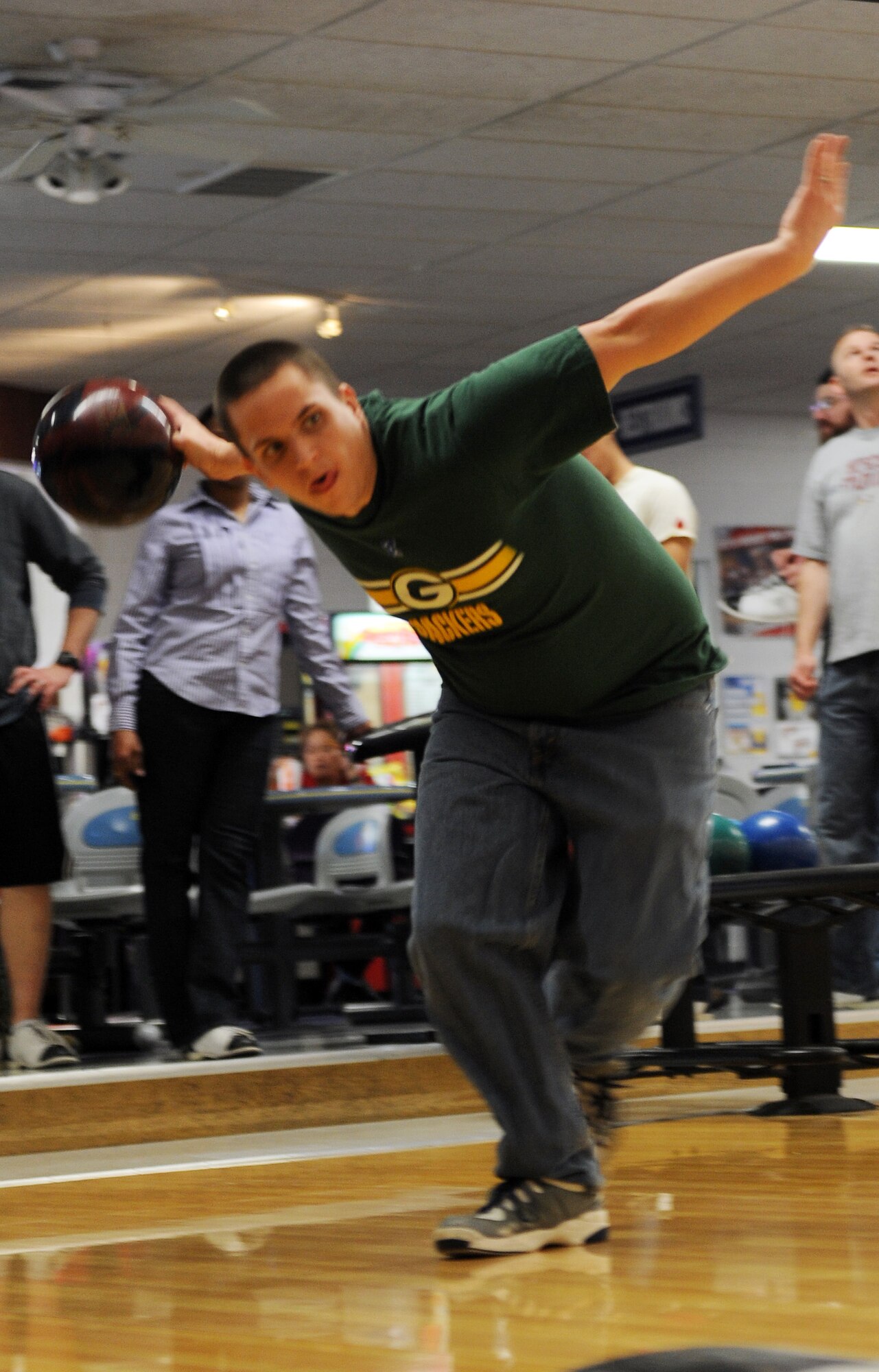 Senior Airman Mark Rosone, 375th Comptroller Squadron financial technician, bowls at Stars and Strikes Bowling Center Feb 18, 2011, at Scott Air Force Base, Ill.  Airman Rosone was a participant in Wing Staff Agencies Wingman Day. (U.S. Air Force photo/ Airman 1st Class Divine Cox)