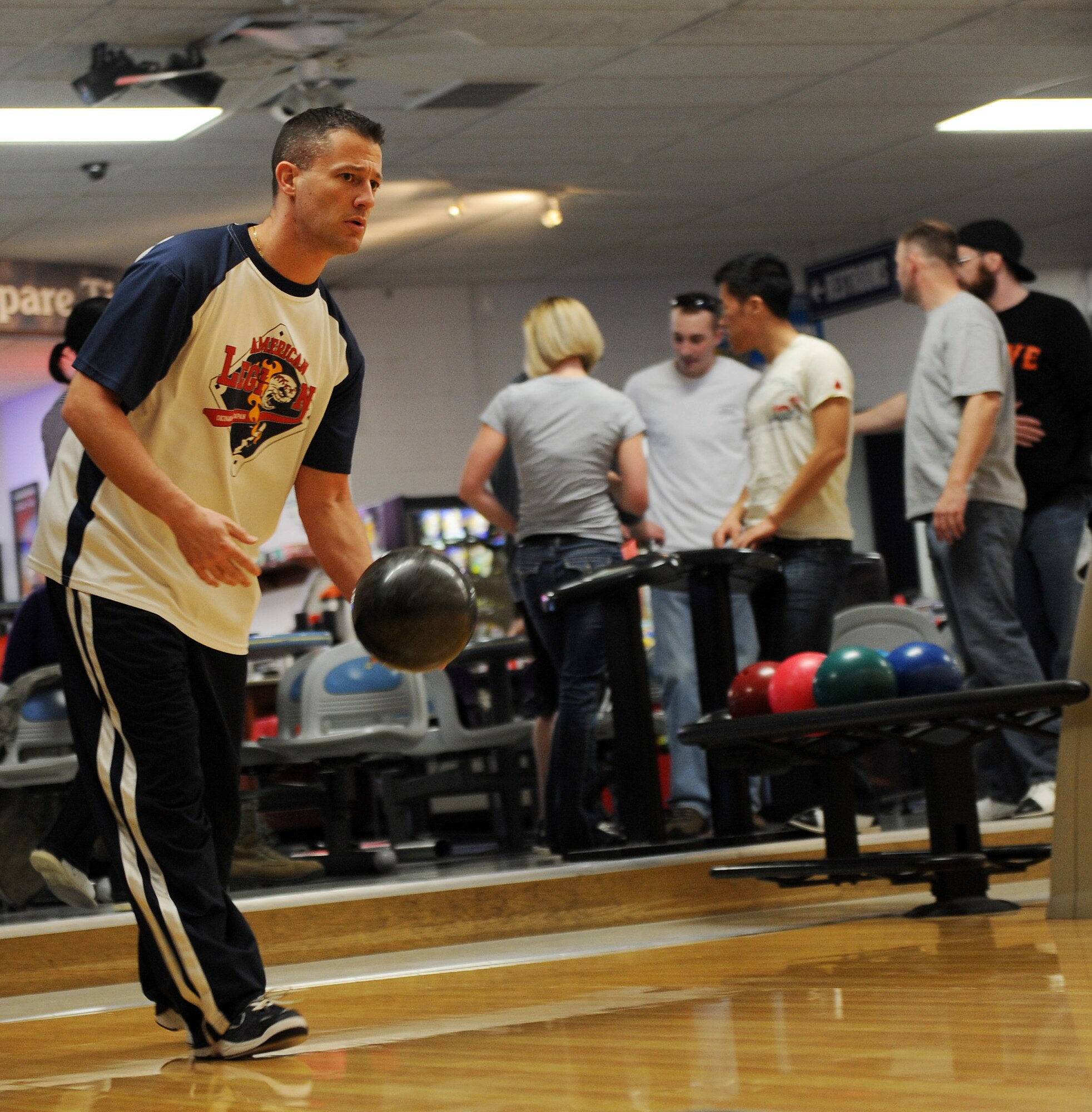 Master Sgt. David DeRemer, 375th Wing Staff Agency first sergeant, bowls at Stars and Strikes Bowling Center Feb 18, 2011, at Scott Air Force Base, Ill.  Sergeant DeRemer was a participant in Wing Staff Agencies Wingman Day. (U.S. Air Force photo/ Airman 1st Class Divine Cox) 