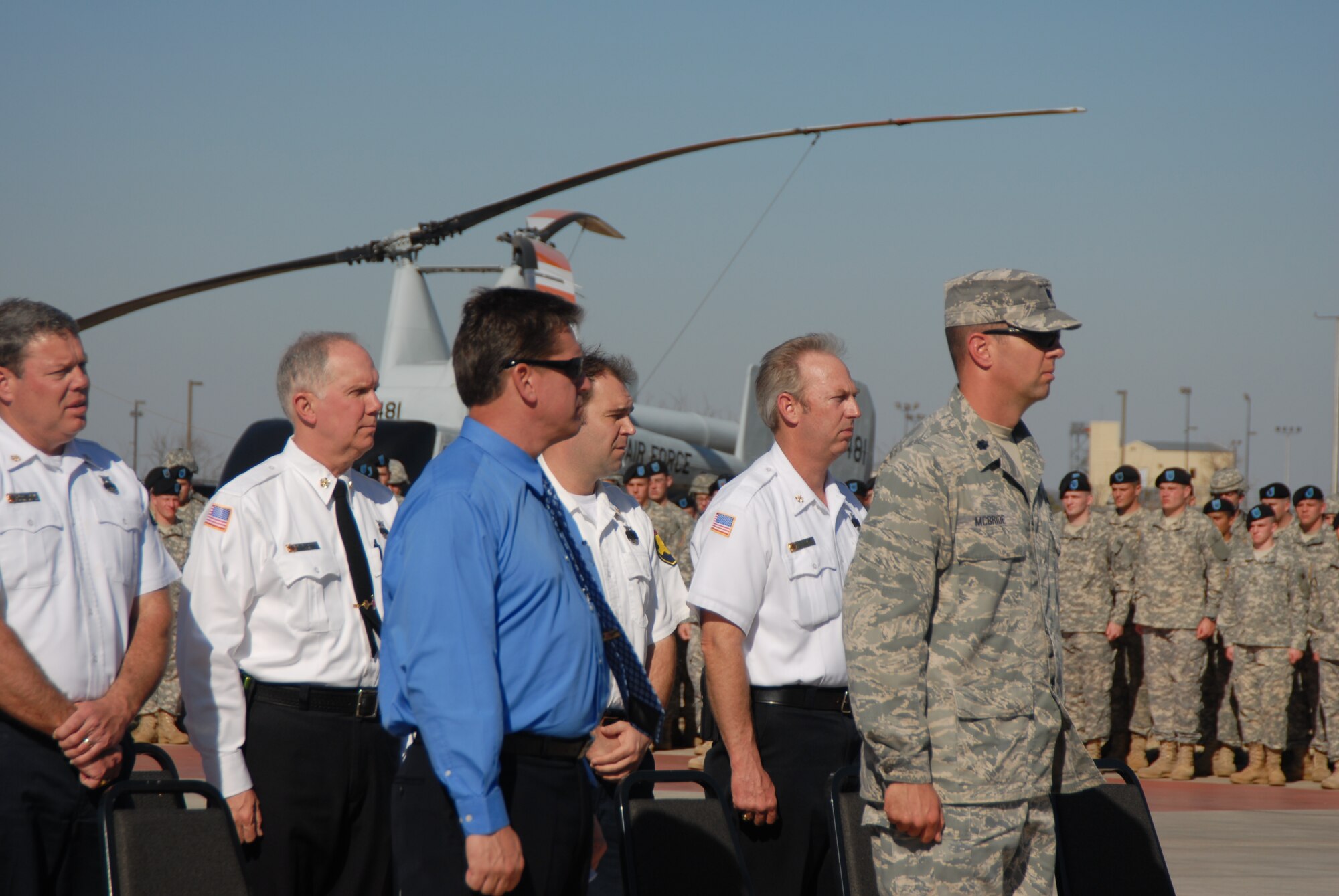 GOODFELLOW AIR FORCE BASE, Texas – Lt. Col. Jeffrey McBride. 312th Training Squadron Commander, stands with Team Goodfellow firefighters during a memorial service held in honor of Airman 1st Class Derek Kozorosky, a firefighter stationed at Kadena Air Force Base, Okinawa, Japan. Airman Kozorosky died Feb. 11, following a tragic vehicle backing incident at the Kadena Headquarters Fire Station. (U.S. Air Force photo/Airman 1st Class Anne Gathua) 