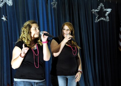 Corinda Kratz and Cheyenne Rauscher perform at the Family and Teen Talent Competition.  It was held at Randolph Air Force Base, Texas(U.S. Air Force photo/Melissa Peterson)