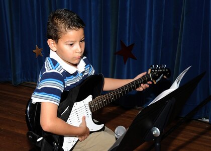 Brandon Seiffert  performs at the Family and Teen Talent Competition.  It was held at Randolph Air Force Base, Texas(U.S. Air Force photo/Melissa Peterson)