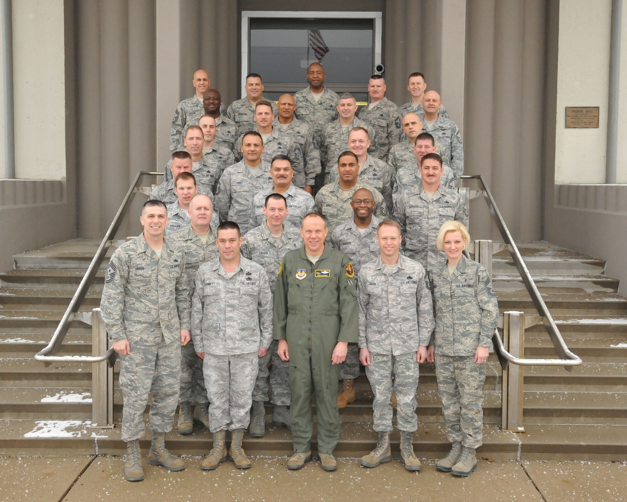 Air Force Materiel Command's newest chief master sergeants pose with Gen. Donald Hoffman, AFMC Commander (front center), Chief Master Sgt. Eric Jaren, AFMC Command Chief (front left), and Chief Master Sgt. Angela Cassel, class mentor (front right), at the 2011 AFMC Chiefs' Orientation. (U.S. Air Force photo/Master Sgt. Brendan Kavanaugh)