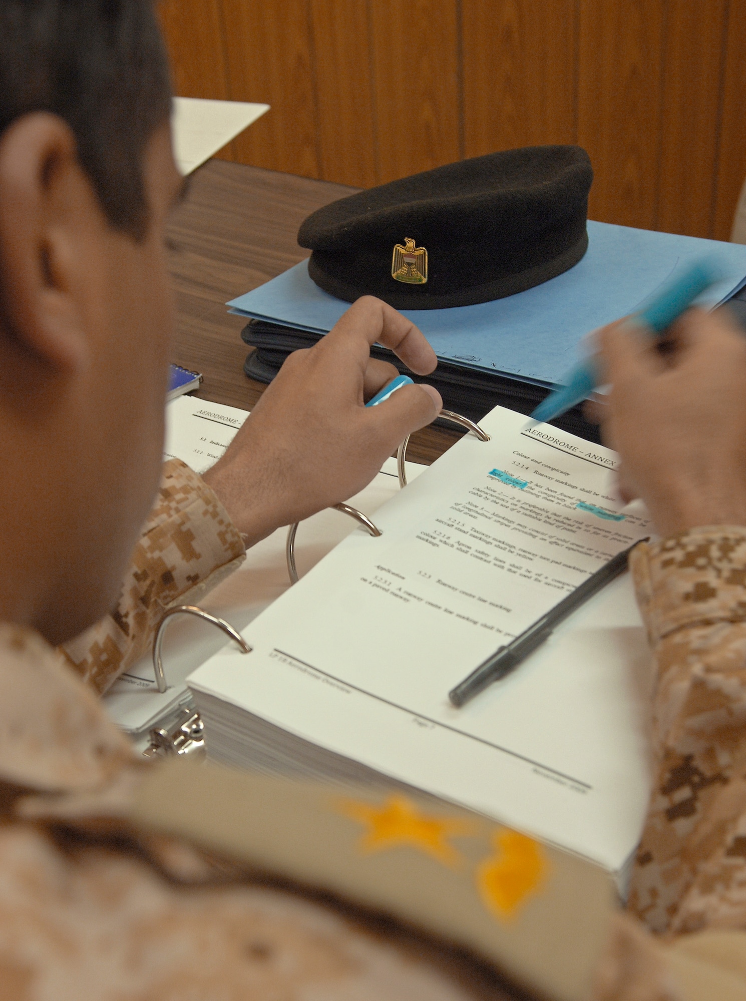 An Iraqi air force student highlights course notes Feb. 3, 2011, during an Iraq Training and Advisory Mission-Air aerodrome class. (U.S. Air Force photo/Tech. Sgt. Jason Lake)