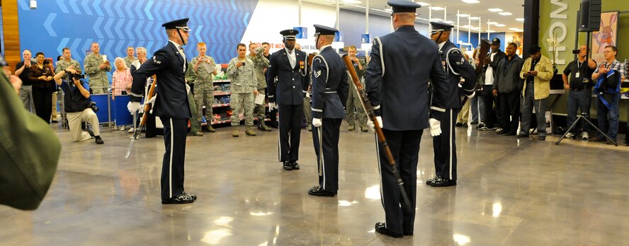 Members of The U.S. Air Force Honor Guard drill team perform Feb. 16 at the Base Exchange on Tinker AFB, Okla. The drill team performs to represent the Airmen serving around the world in the Air Force. (U.S. Air Force photo by Airman 1st Class Tabitha N. Haynes)