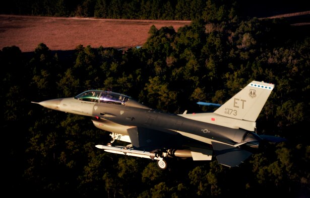 An F-16 Fighting Falcon from the 40th Flight Test Squadron prepares for landing at Eglin Air Force Base, Fla., after a test mission.  The jet was part of a Miniature Air Launch Decoy-Jammer test Feb. 8.  The Miniature Air Launched Decoy-Jammer is an air-launched programmable craft that duplicates the combat flight profiles and signatures of U.S. and allied aircraft.  (U.S. Air Force photo/Staff Sgt. Joely Santiago) 