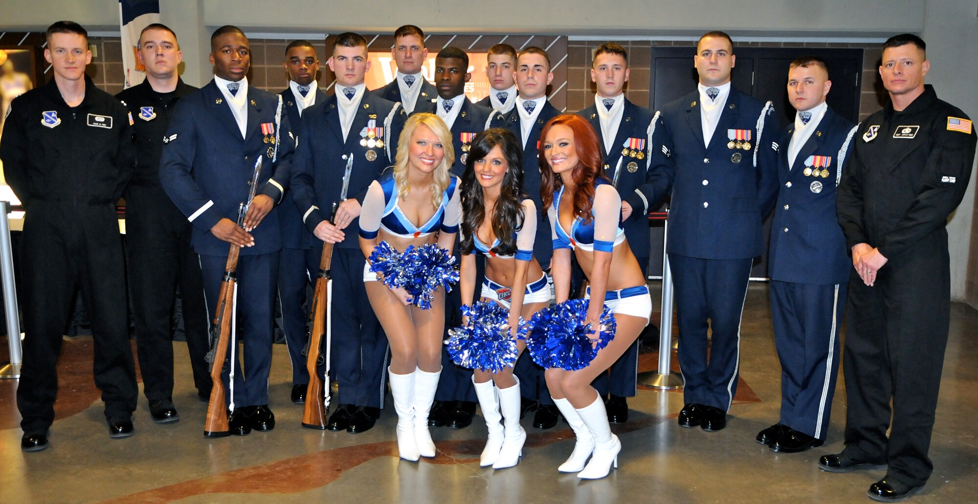 The U.S. Air Force Honor Guard drill team was cheered on the Oklahoma City Thunder Cheerleaders Feb. 15 at the thunder stadium. The drill team performed the halftime show during the game, representing service members for military appreciation night. (U.S. Air Force photo by Airman 1st Class Tabitha N. Haynes)