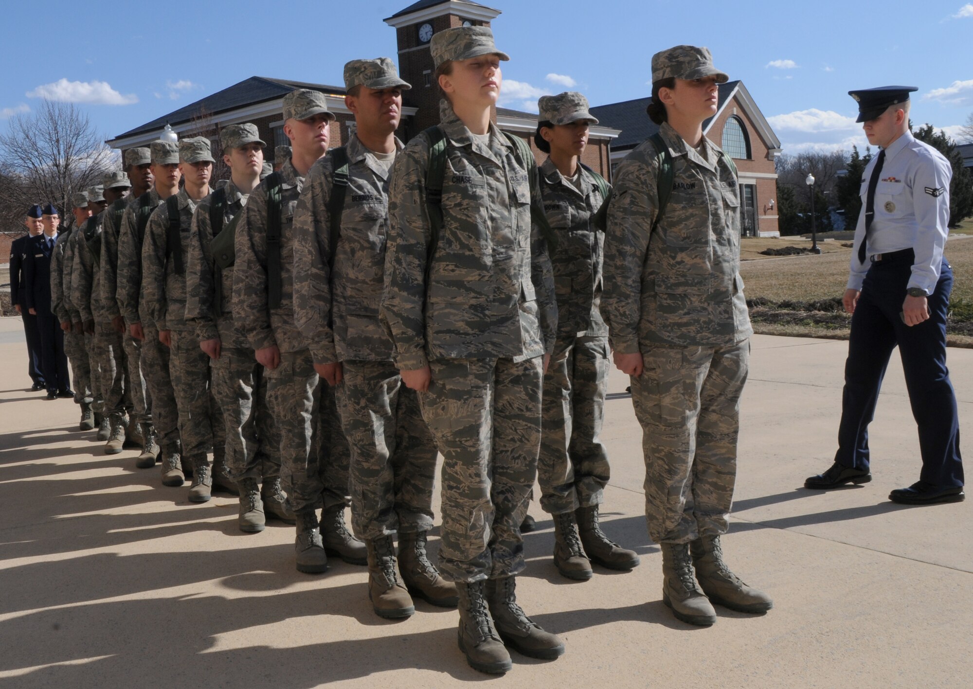 Airman 1st Class Patrick Prendergast, training instructor in The U.S. Air Force Honor Guard, inspects the incoming honor guard trainees while they stand in formation Feb. 14, at Joint Base Anacostia-Bolling, Washington, D.C. The new trainees complete eight weeks of technical training before they are qualified to participate in the honor guard’s mission at Arlington National Cemetery. (U.S. Air Force photo by Senior Airman Christopher Ruano)
