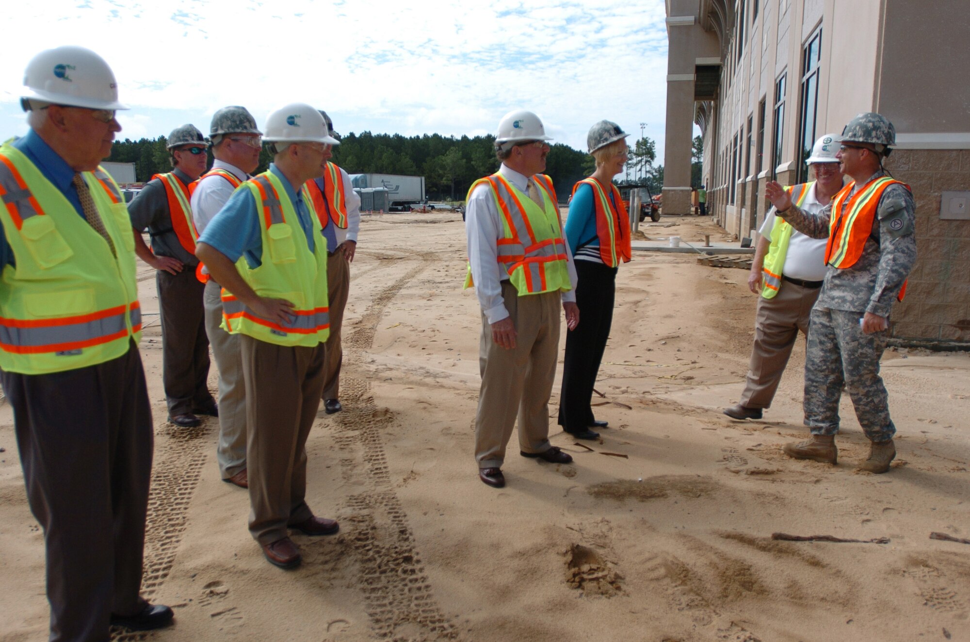 SUMTER, S.C. (August 16, 2010) - Sergeant 1st Class Ronald Herd, Third Army and U.S. Army Central advance party noncommissioned officer in charge,speaks to members of the Sumter, Chamber of Commerce and city of Sumter staff during a tour of the construction of Third Army's new headquarters here last summer. Third Army leaders say the transition to Shaw is currently
well underway in accordance with the Base Realignment and Closure-mandated decision to close Fort McPherson, Ga. and move the command here. (U.S. Army photo/ Army Sgt. Beth Lake, Third Army Public Affairs)
VIRIN:100816-A-0564L-001
