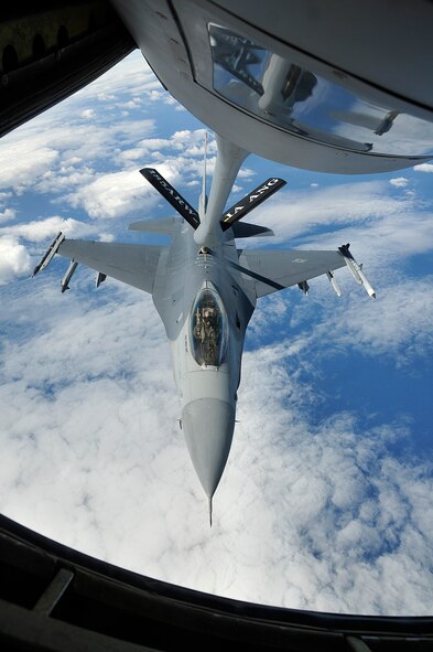 An F-16C Fighter from the 132nd Fighter Wing, Des Moines, Iowa, Iowa Air National Guard, receives fuel from a KC-135 Tanker from the 185th Air Refueling Wing (ARW) Sioux City, Iowa. The aircraft are off the east coast of Australia. The 185th ARW is participating in a joint flight exercise, "Sentry Down Under". Flight crews from the 185th are refueling F-16 and Australian F-18 aircraft while temporarily based at the Royal Australian Air Force (RAAF) Base, Williamtown, New South Wales, Australia.
(USAF Photo/ Tech. Sgt. Oscar M. Sanchez-Alvarez)
