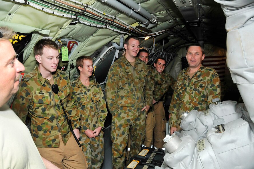 Avionics specialist Tech. Sgt. Darin Winfree (left) of the 185th Air Refueling Wing (ARW), Sioux City, Iowa, Iowa Air National Guard, guides a tour of Royal Australian Air Force (RAFF) Fireman through the Iowa National Guard KC-135 refueling aircraft. Members of the Iowa National Guard are in Williamtown, New South Wales, Australia, on February 22, 2011. The 185th ARW is participating in a joint flight exercise, "Sentry Down Under", refueling F-16C and Australian F-18 aircraft while in Australia.
(USAF Photo/ Tech. Sgt. Oscar M. Sanchez-Alvarez)
