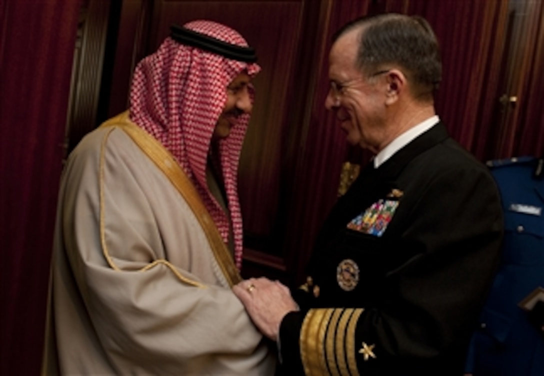 Chairman of the Joint Chiefs of Staff Adm. Mike Mullen, U.S. Navy, greets Saudi Arabian Assistant Minister of Defense and Aviation Prince Khalid bin Sultan in Riyadh on Feb. 21, 2011.  Mullen is on a weeklong trip through the Middle East to reassure friends and allies of the U.S. commitment to regional stability.  