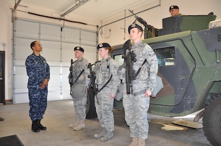 Vice Admiral Cecil Haney, U.S. Strategic Command deputy commander, receives a security forces post-brief from Senior Airman\r\nJared Sparks, Airmen 1st Class Sara Wimberly and Adam Guy, and Airman Yaxcel Interian, all from 790th Missile Security Forces\r\nSquadron, during a visit to Warren&#039;s Missile Alert Facility Juliet-01 Feb. 22.