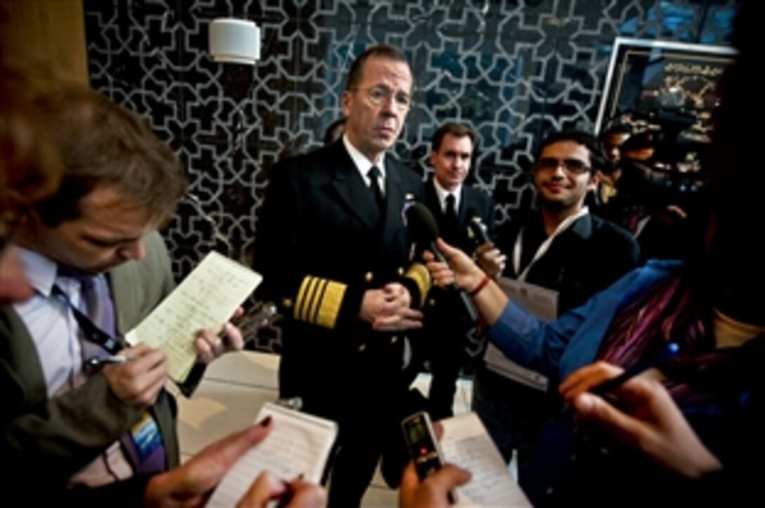 U.S. Navy Adm. Mike Mullen, chairman of the Joint Chiefs of Staff, addresses the media in Abu Dhabi, United Arab Emirates, Feb. 22, 2011. Mullen continues a weeklong trip through the Middle East to reassure friends and allies of the U.S. commitment to regional stability.