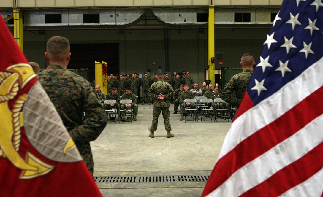 Marines with 2nd Maintenance Battalion, 2nd Marine Logistics Group, stand in formation during an awards ceremony aboard Camp Lejeune, N.C., Feb. 23, 2011. During the ceremony, 1st Sgt. Anthony J. Pompos, first sergeant for Ordnance Maintenance Company, 2nd Maintenance Battalion, 2nd Marine Logistics Group, was awarded the Bronze Star Medal for his heroic service in connection with combat operations against the enemy while serving as first sergeant for Bravo Company, 1st Battalion, 6th Marine Regiment, Marine Expeditionary Brigade - Afghanistan, on Feb. 13, 2010, in support of Operation Enduring Freedom. (U.S. Marine Corps photo by Pfc. Franklin E. Mercado)