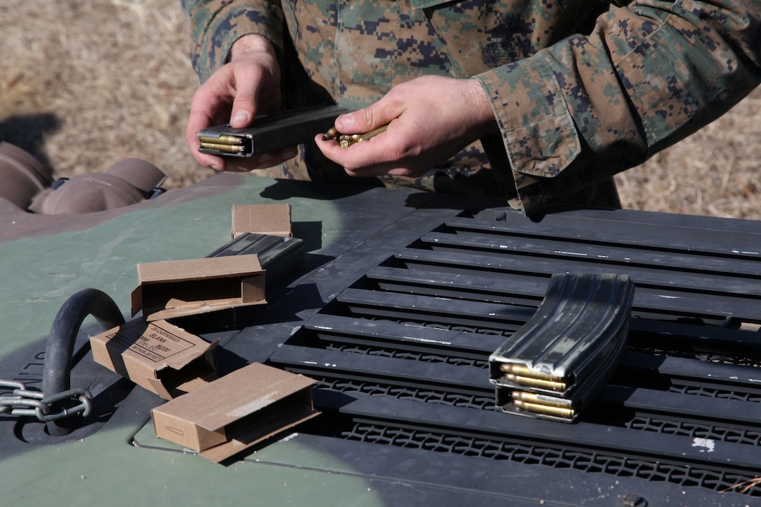 A 2nd Low Altitude Air Defense Battalion Marine loads blank rounds into his magazines in preparation for upcoming training exercises at Landing Zone Lark, Marine Corps Base Camp Lejeune, N.C., Feb. 23. During the field training exercise, Battery B of 2nd LAAD trained to conduct military operations in urban terrain, maintain security of an entry control point, and shoot down hostile aircraft with Stinger weapons.