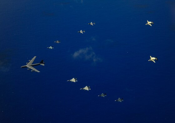 A U.S. Air Force B-52 Stratofortress aircraft from the 20th Expeditionary Bomb Squadron leads a formations of two F-16 Fighting Falcon aircraft assigned to the 18th Aggressor Squadron, an F-16CJ Fighting Falcon from Misawa, Japan, an F-15J Eagle from Chitose Japan, two Japanese Air Self-Defense Force F-2 attack fighters from the 6th Tactical Fighter Squadron, two U.S. Navy EA-6B Prowler aircraft from the Electronic Attack Squadron, an U.S. Navy E-2C Hawkeye and a Japanese E-2C Hawkeye aircraft on a flight over Guam during exercise Cope North Feb. 21, 2011.  The U.S. Air Force and Japanese Air Self-Defense Force conduct Cope North annually at Andersen Air Force Base, Guam to increase combat readiness and interoperability concentrating on coordination and evaluation of air tactics, techniques and procedures. (U.S. Air Force photo by Staff Sgt. Angelita M. Lawrence/Released)