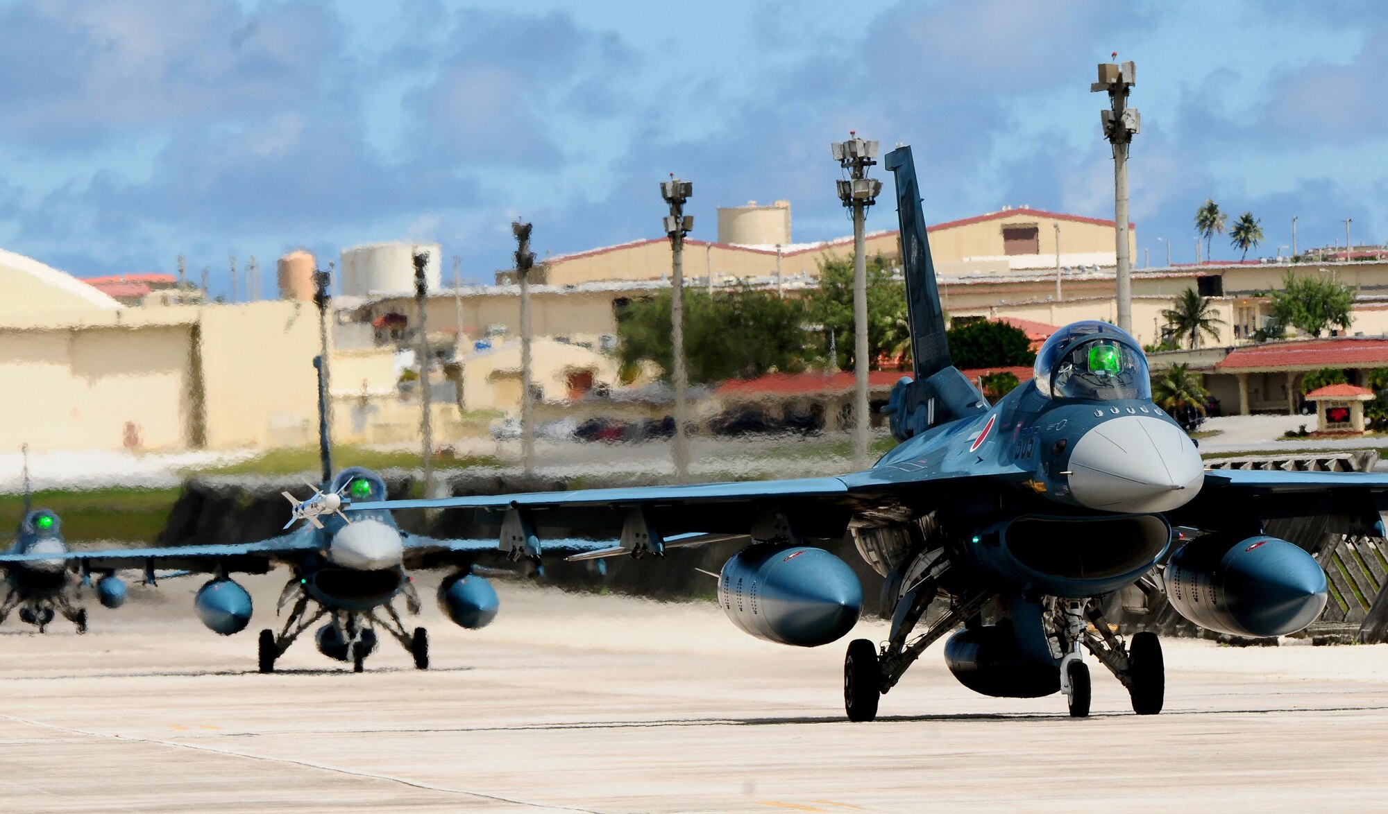ANDERSEN AIR FORCE BASE, Guam - Japan Air Self Defense Force F-2  fighters taxi after arriving here Feb. 11, for the exercise Cope North 11-1. This will be the 11th time the United States and Japan have held a Cope North exercise on Guam and the largest in scope to date. (U.S. Air Force photo/ Airman 1st Class Jeffrey Schultze)