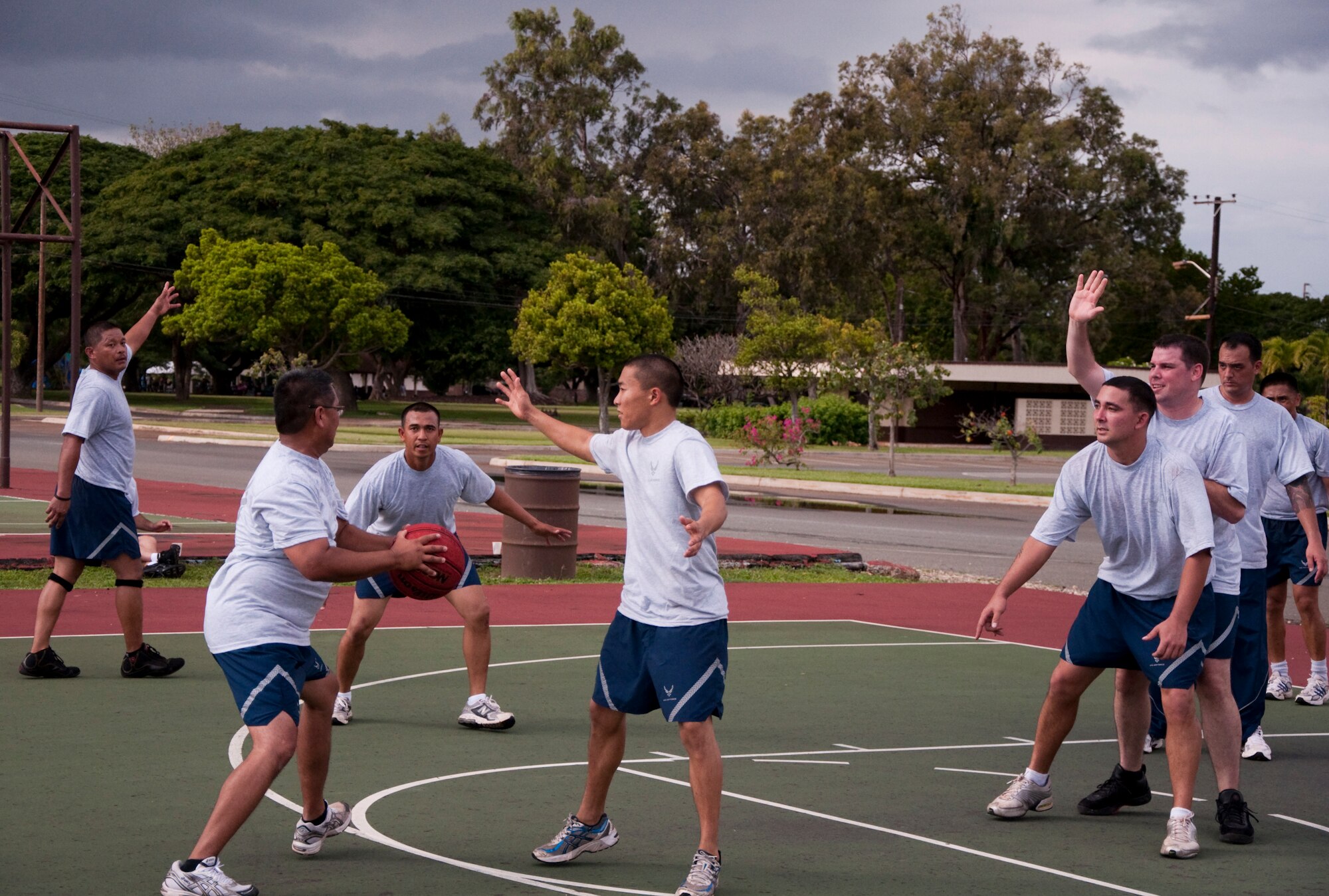 Members of the 48th Aerial Port Squadron, Joint Base Pearl Harbor-Hickam, Hawaii, play a game of basketball, Feb. 13, as part of their wingman day activities. The theme for Wingman Day 2011 was resiliency and unit members received briefings and participated in various team building exercises. This annual event allows Airmen to step back from their day-to-day Reserve duties and focus on taking care of each other as wingmen. (U.S. Air Force Photo/Staff Sgt. Erin Smith) 