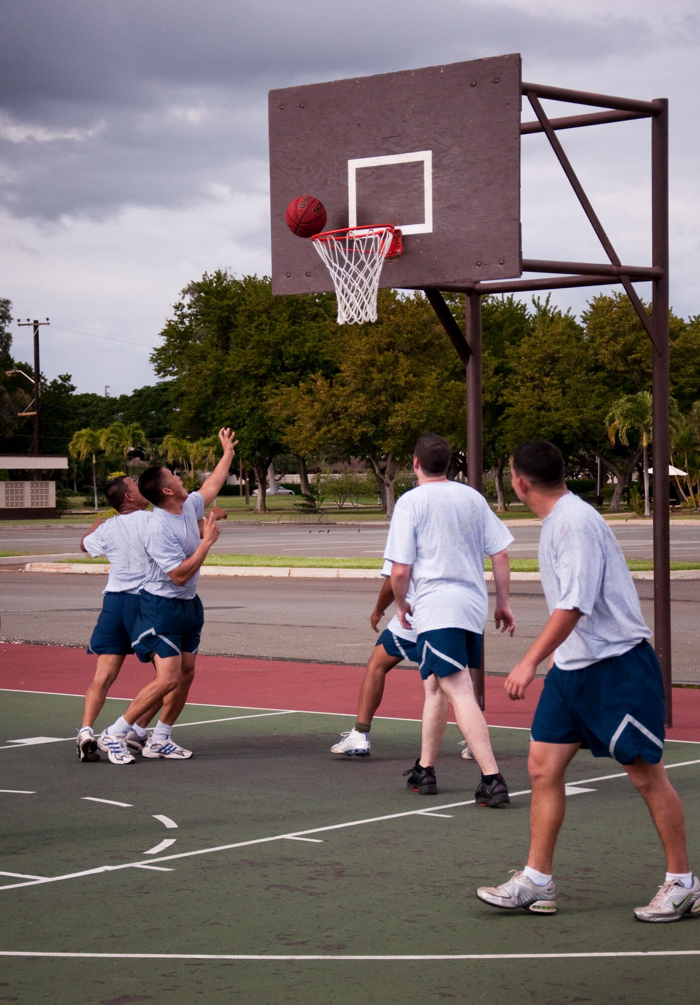 Members of the 48th Aerial Port Squadron, Joint Base Pearl Harbor-Hickam, Hawaii, play a game of basketball, Feb. 13, as part of their wingman day activities. The theme for Wingman Day 2011 was resiliency and unit members received briefings and participated in various team building exercises. This annual event allows Airmen to step back from their day-to-day Reserve duties and focus on taking care of each other as wingmen. (U.S. Air Force Photo/Staff Sgt. Erin Smith) 