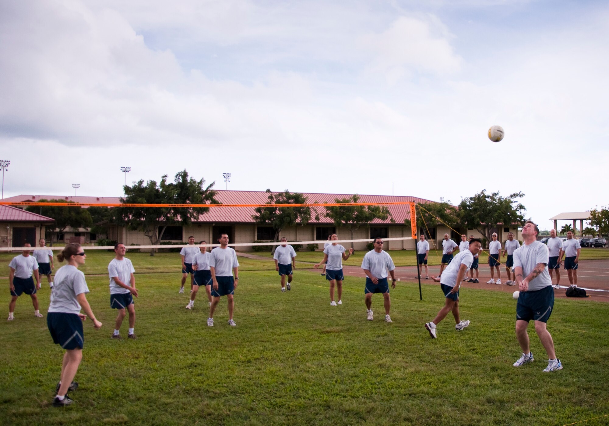 Members of the 48th Aerial Port Squadron, Joint Base Pearl Harbor-Hickam, Hawaii, play a game of volleyball, Feb. 13, as part of their wingman day activities. The theme for Wingman Day 2011 was resiliency and unit members received briefings as and participated in various team building exercises. This annual event allows Airmen to step back from their day-to-day Reserve duties and focus on taking care of each other as wingmen. (U.S. Air Force Photo/Staff Sgt. Erin Smith) 