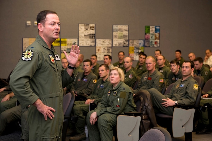 NELLIS AIR FORCE BASE, Nev. -- Col. Richard Coe, U.S. Air Force Weapons School commandant, discusses leadership principles with U.S. Air Force Weapons School students Feb. 22. The USAFWS provides the highest level of tactical training to future leaders in air, space and cyberspace and recently modified its syllabus to include formal leadership education and training. (U.S. Air Force photo/Senior Airman Brett Clashman)