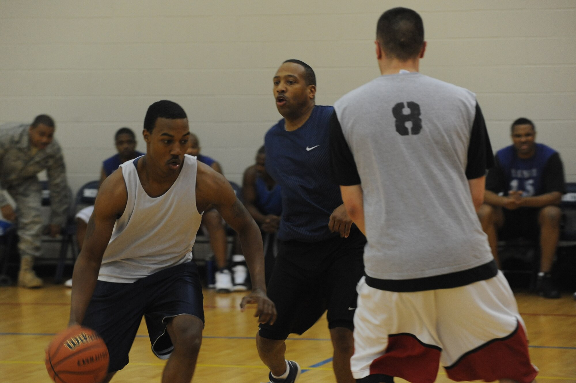 MINOT AIR FORCE BASE, N.D. -- The McAdoo fitness center held its first ever Old School (over 30) vs New School (intramurals) basketball event here Feb. 22. With six seconds left in overtime, New School was victorious after stealing and dunking the game ball. The final score was 74-71. (U.S. Air Force photo/Airman 1st Class Aaron-Forrest Wainwright)

