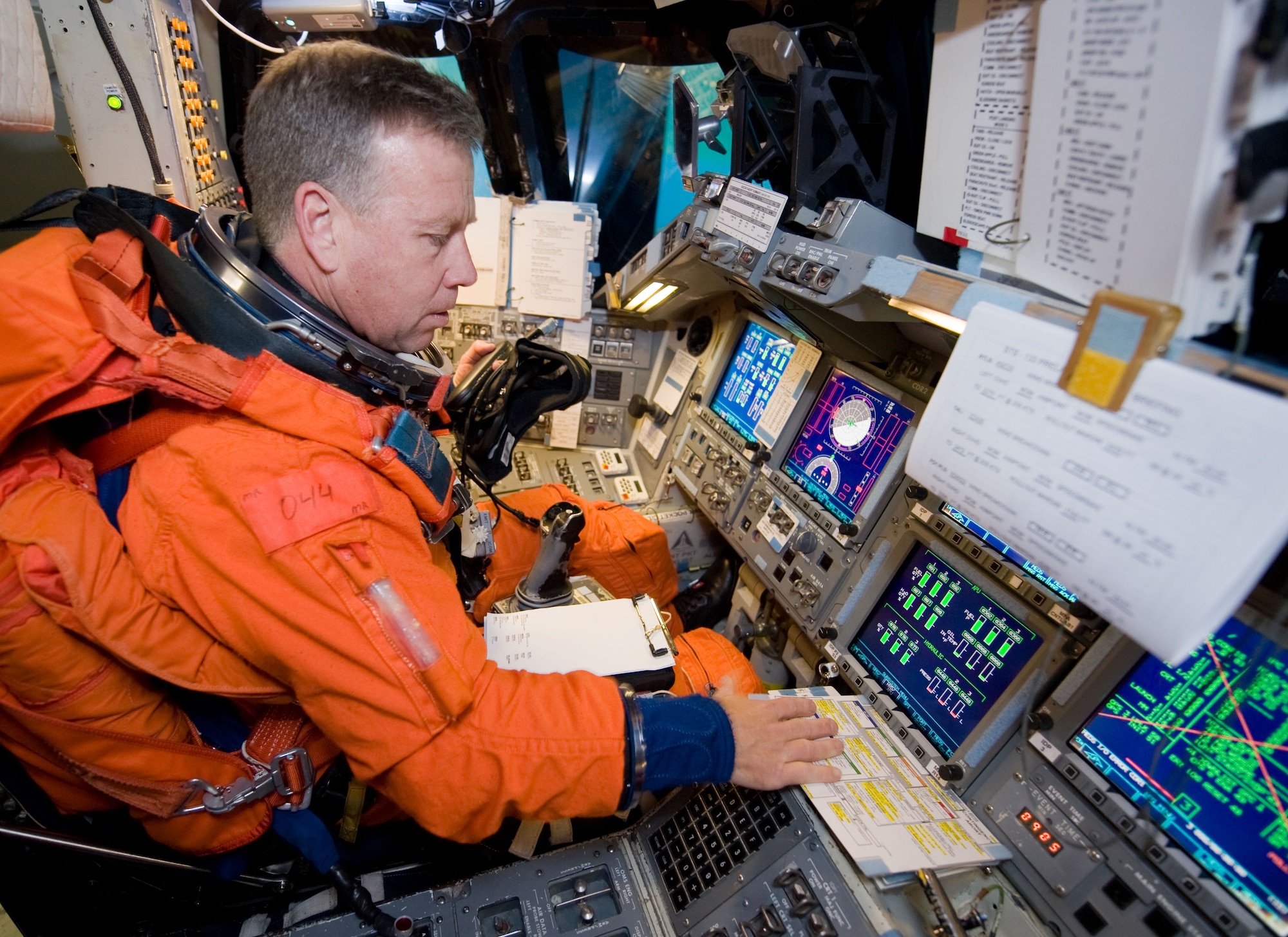 NASA astronaut Steven Lindsey occupies the commander's station during a simulation in the motion-base shuttle mission simulator at the Johnson Space Center in Houston Jan. 25, 2010. Mr. Lindsey, a 1982 graduate of the Air Force Academy, is the commander for the Space Shuttle Discovery's STS-133 mission, scheduled to lift off Feb. 24, 2011. (NASA photo/James Blair)