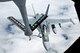 An F-18 Fighter Jet from the Royal Australian Air Force receives fuel from a KC-135 Tanker, from the 185th Air Refueling Wing (ARW) Sioux City, Iowa, Iowa Air National Guard, over the coast of Eastern Australia, in Williamtown, New South Wales, on February 23, 2011. The 185th ARW is participating in a joint flight exercise, 
