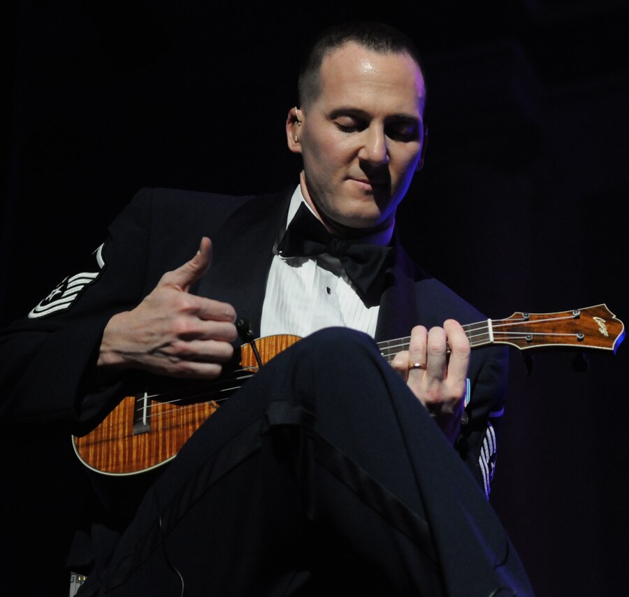 Master Sgt. Matthew Ascione, member of The U.S. Air Force Band, plays the Ukulele Feb. 20 at the DAR Constitution Hall, Washington, D.C. Ensembles Max Impact, Airmen of Note, The Singing Sergeants and The Air Force Strings contribute to The U.S. Air Force Band’s 2011 Guest Artist Series performance. (U.S. Air Force photo by Senior Airman Christopher Ruano)