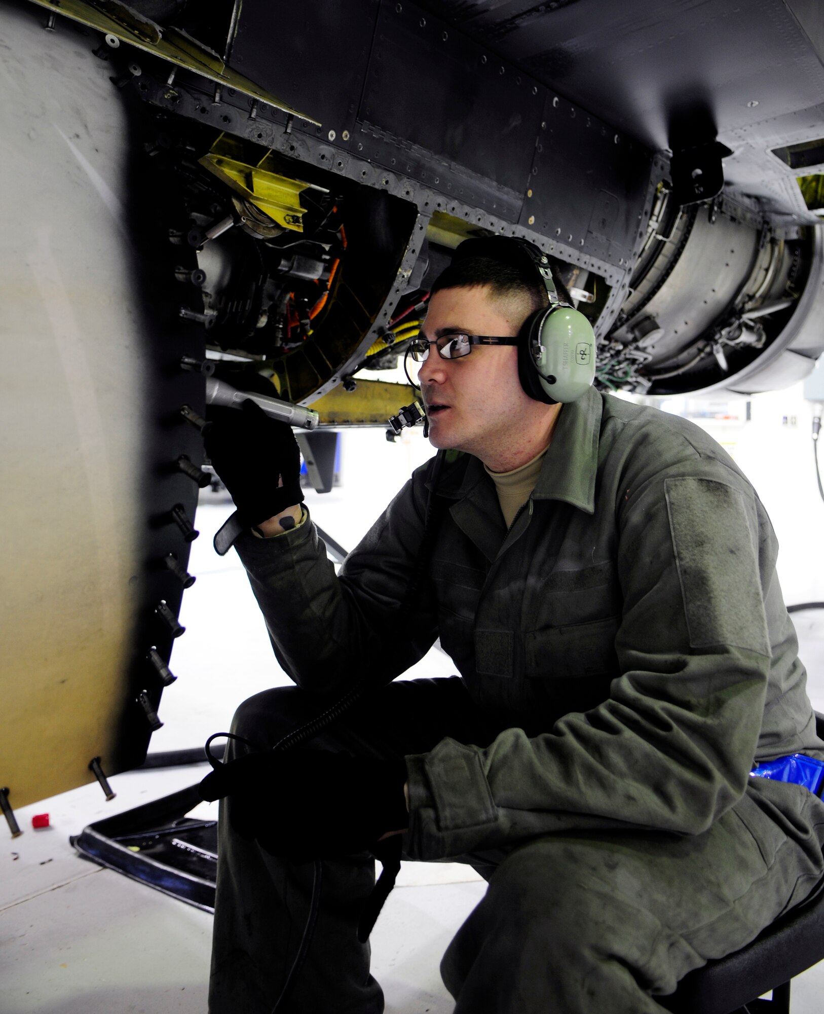Staff Sgt.Tyson Shaffer inspects an F-16 Fighting Falcon aircraft system Feb. 16, 2011, Eielson Air Force Base, Alaska.  F-16's require phase inspections every 300 flying hours to maintain overall quality in various components.  Sergeant Shaffer is assigned to  the 354th Maintenance Squadron as an inspection team member.  (U.S. Air Force photo by/Airman 1st Class Yash Rojas)
