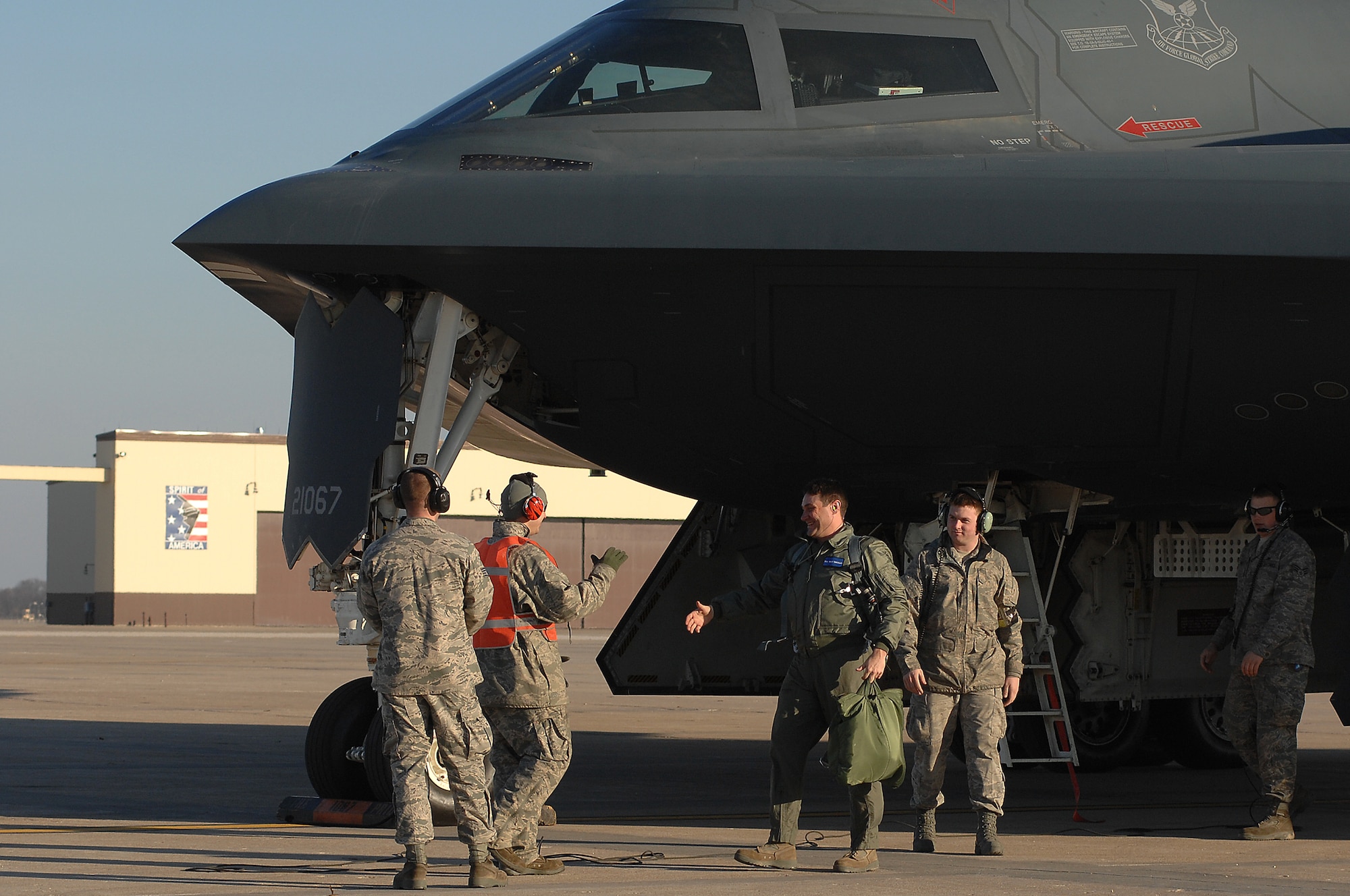 Tech Sgt. David Shockley, 509th Maintenance Group, shakes hands with 509th Bomb Wing Maintainers and Crew Chiefs in celebration after his orientation sortie aboard the B-2 Bomber Feb 22, 2011. Sgt. Shockley was awarded the flight after winning the 2009 eighth Air Force, crew chief of the year. (U.S. Air Force photo by Senior Airman Kenny Holston)(Released) 


