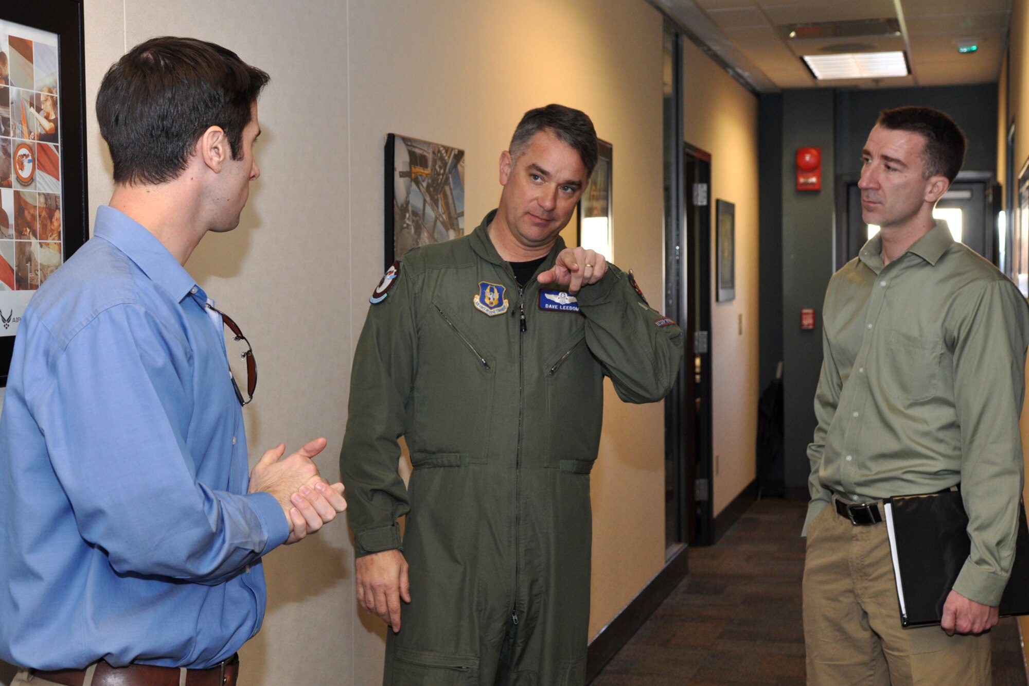 Lt. Col. David Leedom, director of operations, 93rd Bomb Squadron, discusses squadron issues with Mr. Ross Nodurft, (far left) and Maj. Chris Boring, legislative fellow, during their visit to the 307th Bomb Wing and 917th Fighter Group at Barksdale Air Force Base, La., Feb. 22, 2011. Mr. Nodurft is a congressional staffer to Senator Mary Landrieu, who is the senior United States Senator from the State of Louisiana. Mr. Nodurft came to Barksdale to discuss base issues, facilities and future base plans. His visit also included stops at Air Force Global Strike Command and 2nd Bomb Wing facilities. (U.S. Air Force photo/Tech. Sgt. Jeff Walston)