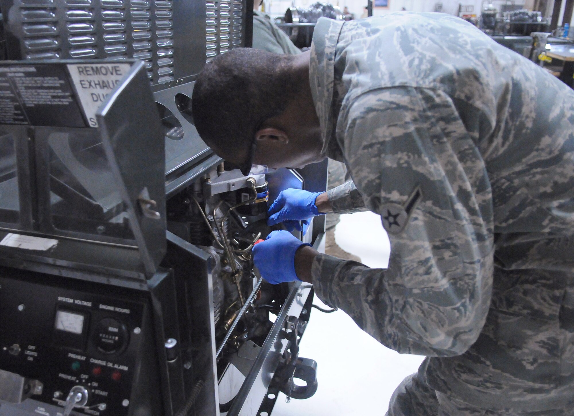 Airman John Wilson performs a phase two inspection on a heating system Feb. 16, 2011, at Eielson Air Force Base, Alaska. By changing the filter, removing and priming the fuel system, Airmen can ensure equipment will function properly. Airman Wilson is a 354th Maintenance Squadron aerospace ground equipment maintainer. (U.S. Air Force photo/Airman 1st Class Janine Thibault)