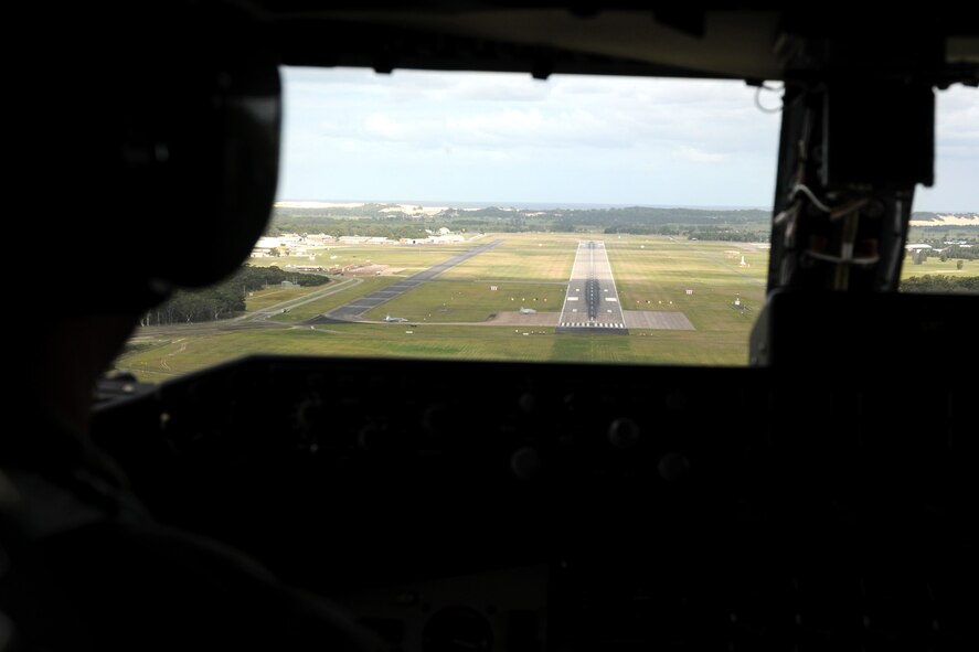 A view from the cockpit of a KC-135 fuel tanker from the 185th Aerial Refueling Wing (185ARW), Sioux City, Iowa, as Maj. Eric Kilburg, pilot, 185ARW, prepares to land at the Royal Australian Air Force Base, Williamtown, Australia on February 22, 2011.  The 185ARW and 132FW are conducting Dissimilar Air Combat Training mission, "Sentry Down Under", with the RAAF Williamtown F-18s.  (US Air Force photo/Staff Sgt. Linda E. Kephart)(Released)