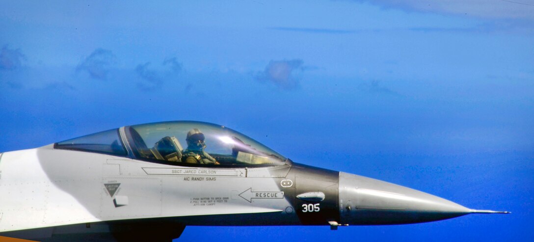 A U.S. Air Force F-16D Fighting Falcon takes off from Andersen Air Force Base, Guam, Feb. 21, 2011. The U.S. Air Force F-16D Falcon pilot is assigned to the 18th Aggressor Squadron, Eielson Air Force Base, Alaska.