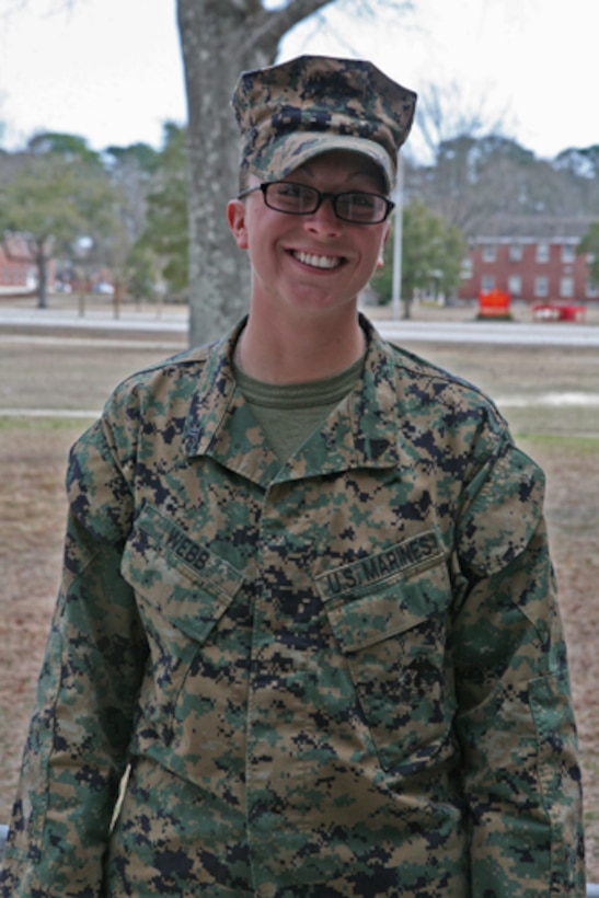Cpl. Sarah Webb is the artist whom painted the first "Marine" rock at Fort Irwin and National Training Center, Calif., upon completing a month-long training evolution there earlier this year. Since she was a child, Webb has embraced art as a hobby and stress relief. (U.S. Marine Corps photo by Cpl. Melissa A. Latty)