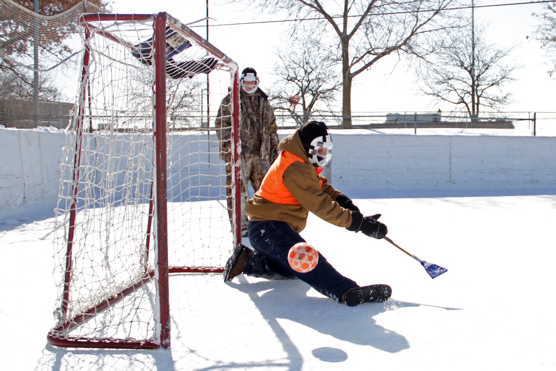 Sgt. Henry Freisner, Recruiting Substation Burnsville, fails to stop his opponents from scoring during a shoot-out at the 2011 Recruiting Station Twin Cities Broomball Tournament Feb. 26. For more photos of the event, visit the RS Twin Cities fan page at www.facebook.com/rstwincities.