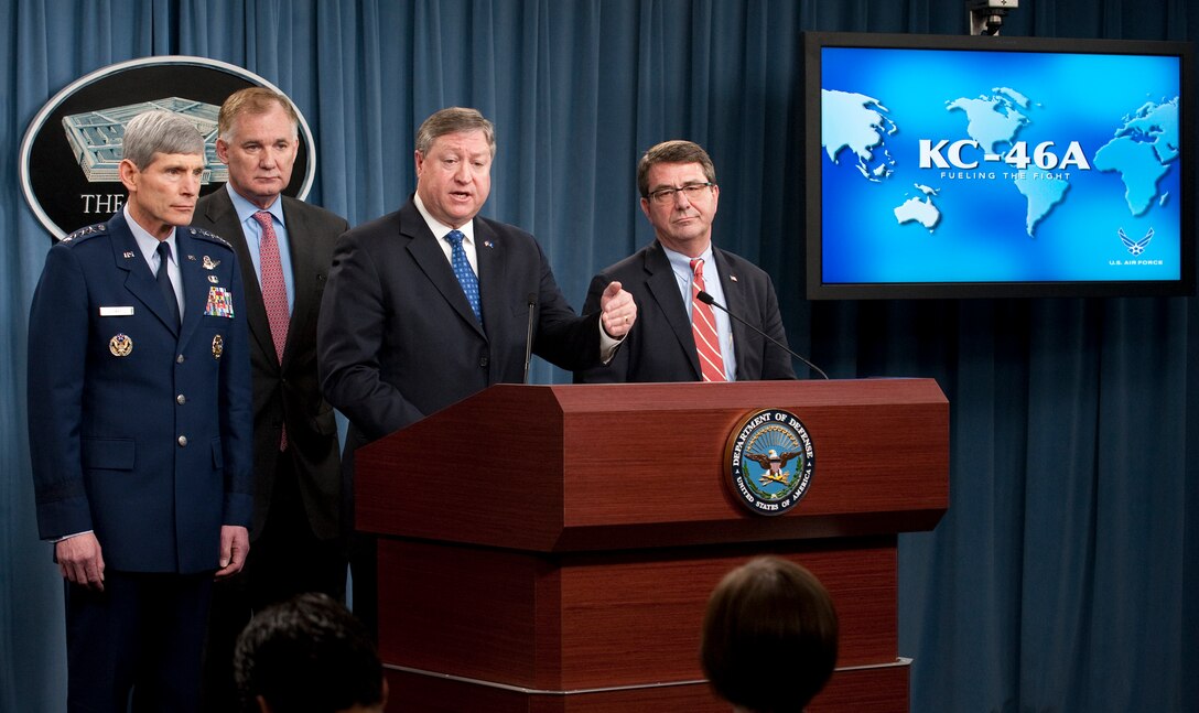Secretary of the Air Force Michael Donley (at podium) answers a question from a reporter after he announced during a press conference in the Pentagon Feb. 24, 2011, that the KC-46A tanker contract was awarded to The Boeing Company. Behind Secretary Donley (from the left) are Air Force Chief of Staff Gen. Norton Schwartz, Deputy Secretary of Defense William Lynn and Undersecretary of Defense for Acquisition, Technology and Logistics Ashton Carter.  (U.S. Air Force photo/Jim Varhegyi)