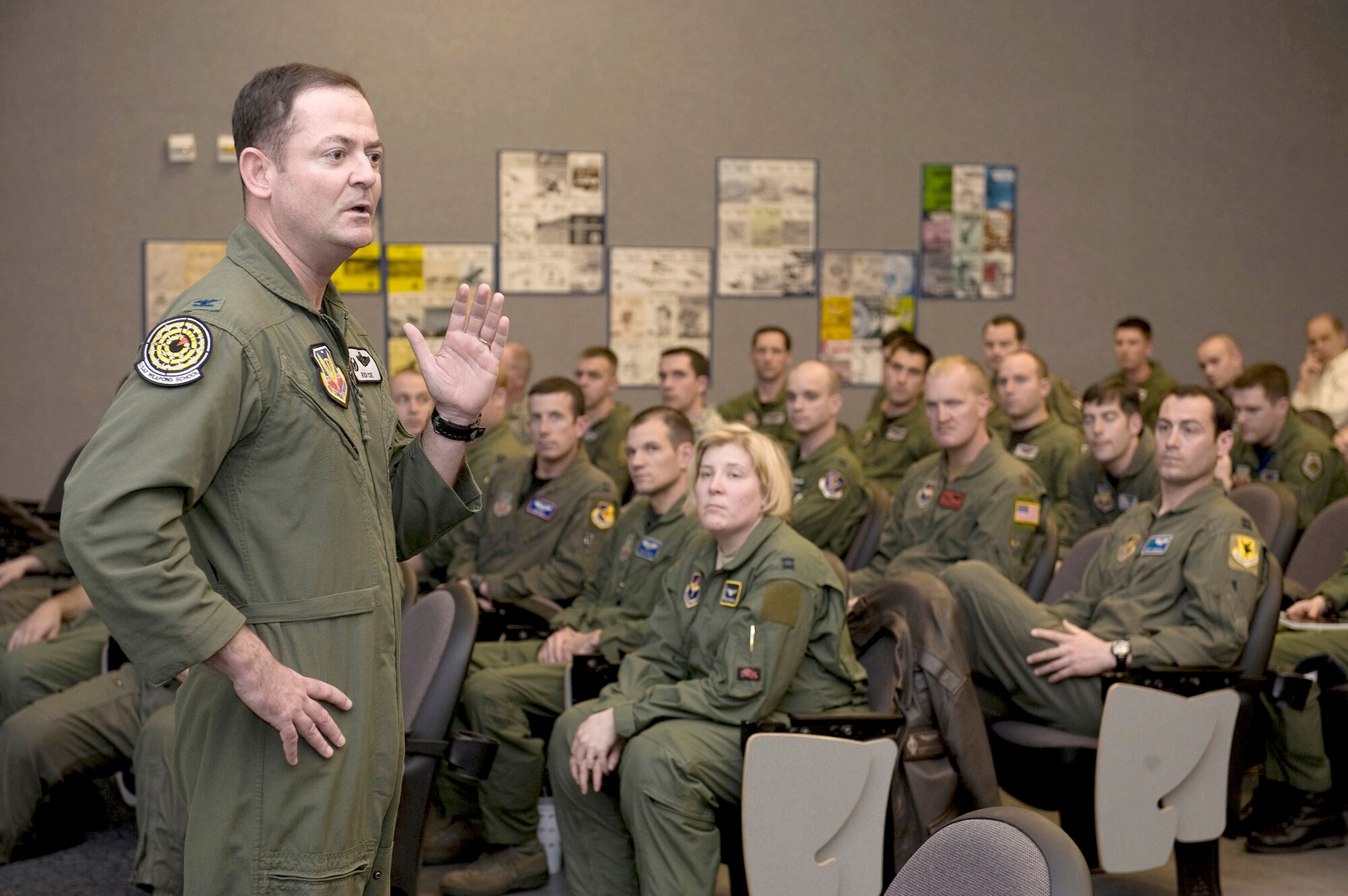 Col. Richard Coe discusses leadership principles with U.S. Air Force Weapons School students Feb. 22, 2011, at Nellis Air Force Base, Nev. USAFWS officials provide the highest level of tactical training to future leaders in air, space and cyberspace and recently modified their syllabus to include formal leadership education and training. Colonel Coe is the USAFWS commandant. (U.S. Air Force photo/Senior Airman Brett Clashman) 