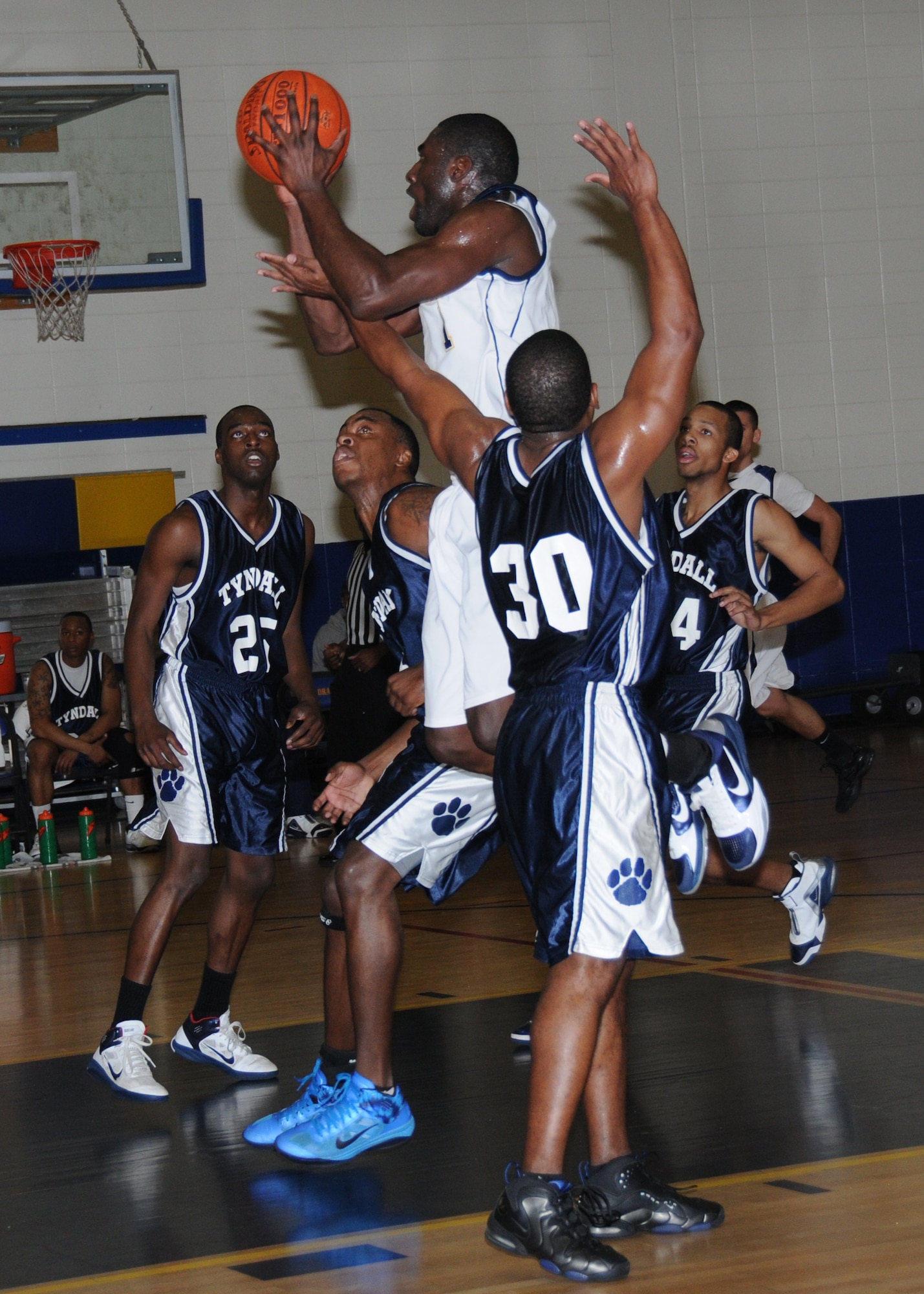 As a member of Keesler’s varsity basketball team, Onyenma “Dan” Nwaelele,  played a key role in defeating Tyndall Air Force Base, Fla., 72-68, Jan. 29.  (U.S. Air Force photo by Kemberly Groue)