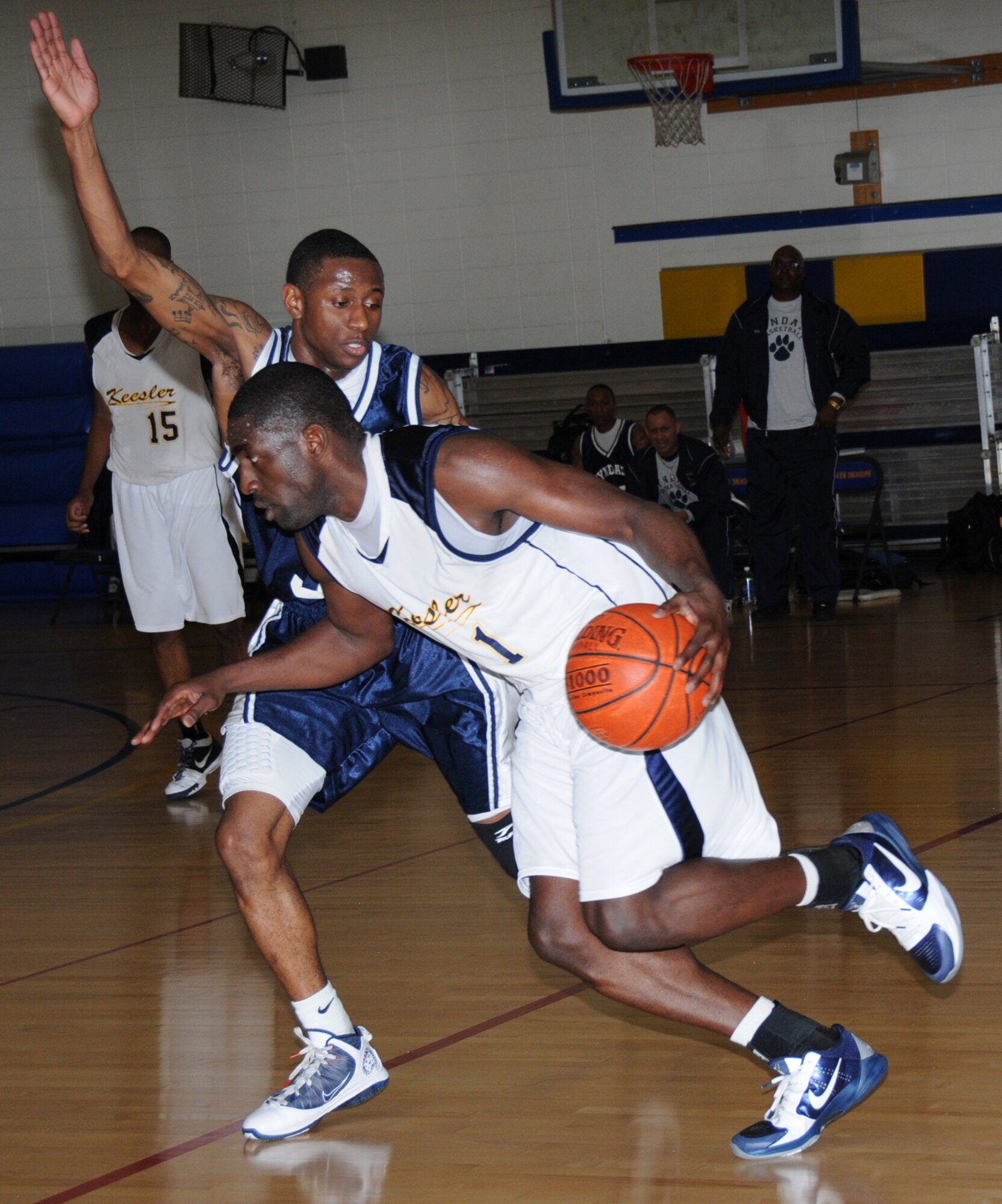 As a member of Keesler’s varsity basketball team, Onyenma “Dan” Nwaelele,  played a key role in defeating Tyndall Air Force Base, Fla., 72-68, Jan. 29.  (U.S. Air Force photo by Kemberly Groue)