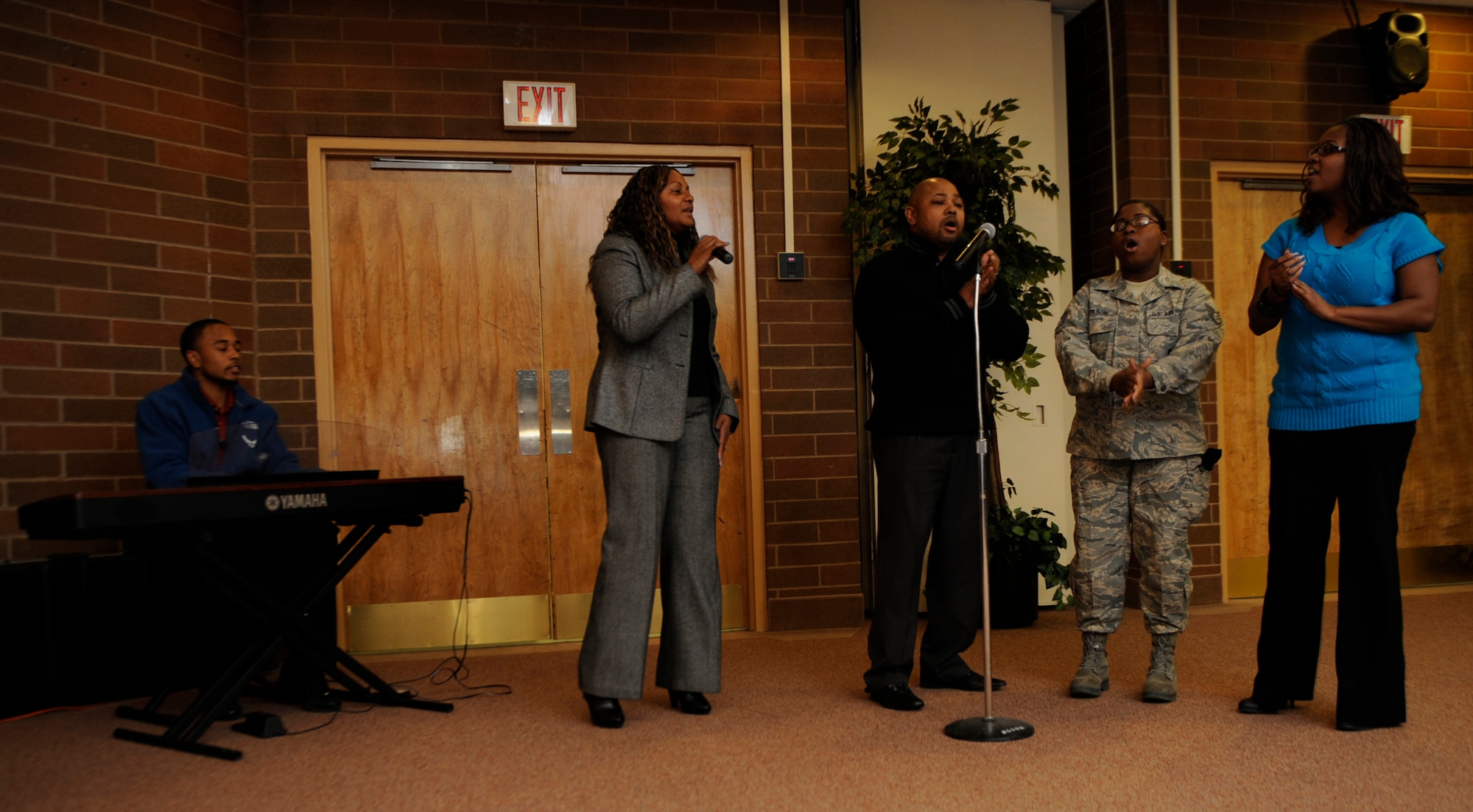 MOUNTAIN HOME AIR FORCE BASE, Idaho -- No Limits Christian Ministries praise team performs during the National Prayer Luncheon Feb. 22 at the Gunfighter Club. The luncheon’s roots can be traced back to 1953, and is now recognized every February at bases across the United States.  (U.S. Air Force photo by Airman 1st Class Renishia Richardson)