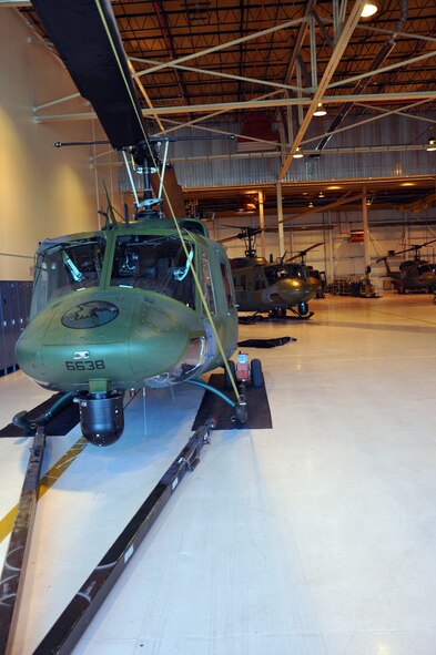 Four Bell UH-1N Huey helicopters stand ready for flight in the 37th Helicopter Squadron hanger at F. E. Warren AFB Feb. 22. (U.S. Air Force photo by Airman 1st Class Dan Gage)