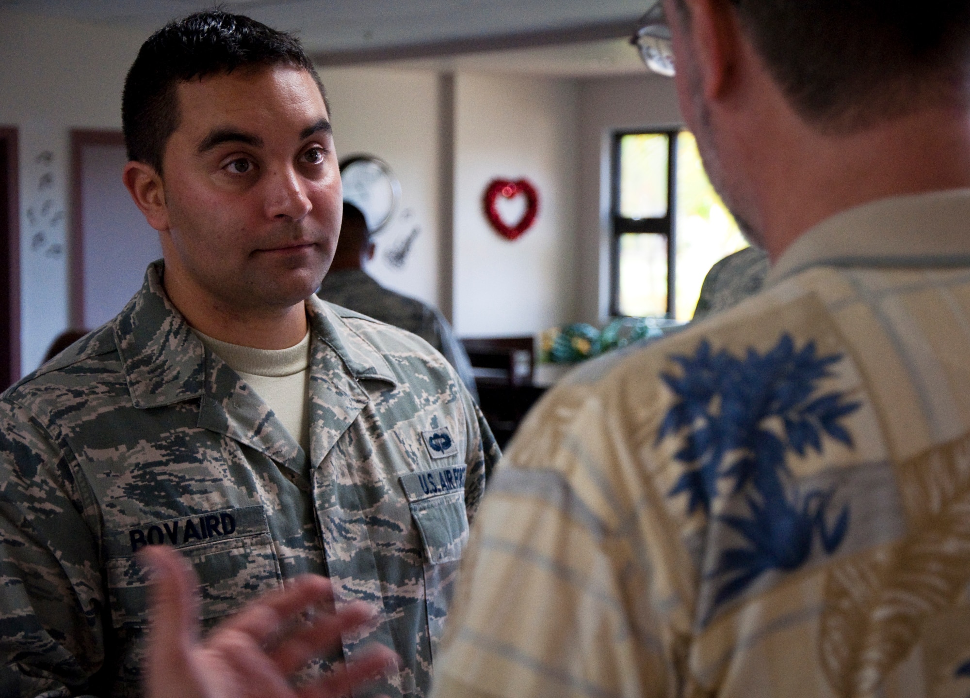 Senior Airman Steven Bovaird, 48th Aerial Port Squadron, talks with Mark Blice-Baum, 647th Force Support Squadron Work and Family Life Specialist, about saving and investing at the 624th Regional Support Group’s 2011 Financial Fair, Feb. 12, at the Makai Recreation Center. The event, in support of Military Saves Week which runs from Feb. 20-27, included classes on retirement, saving and investing and finance for teens. Financial stability is a large factor in deployment readiness and the fair offered resources and information necessary to help with financial readiness. (U.S. Air Force photo/Staff Sgt. Erin Smith)
