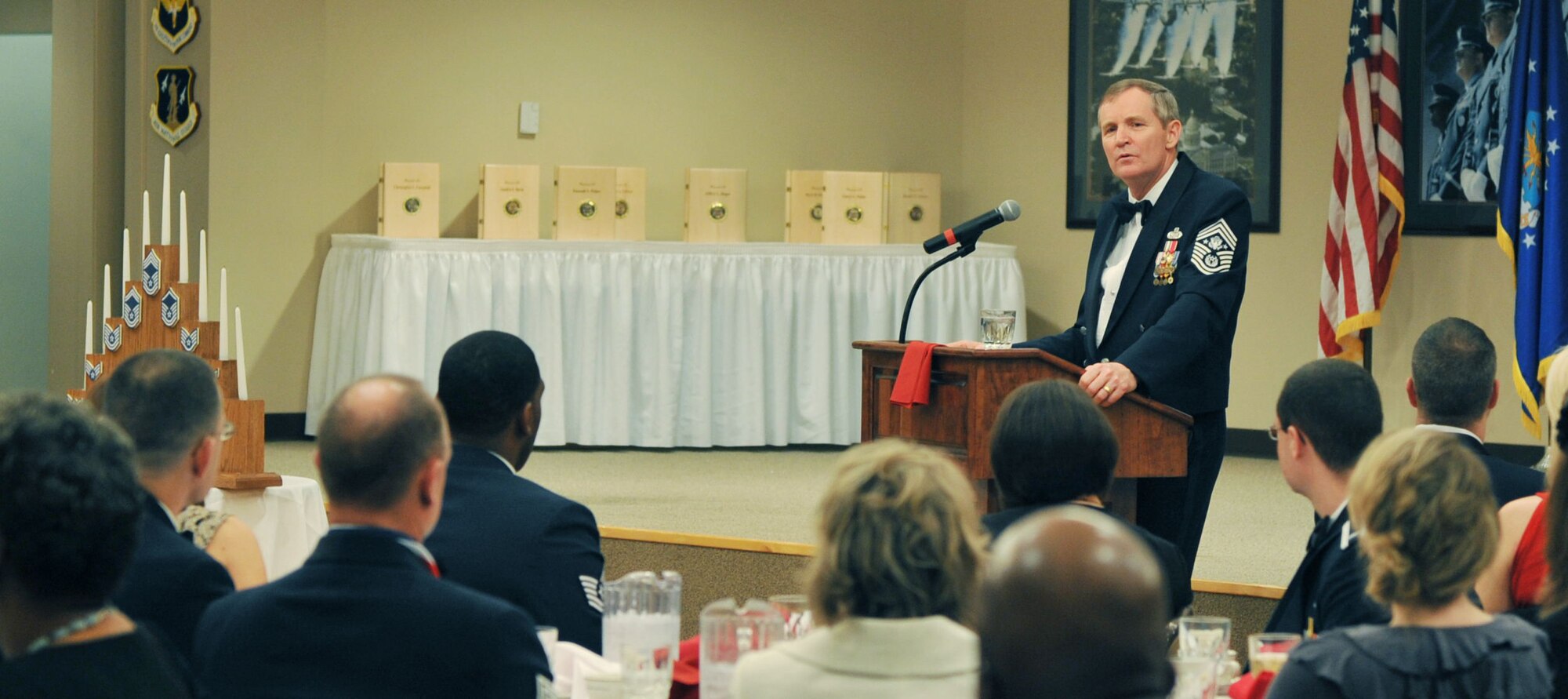 Retired Chief Master Sgt. of the Air Force Eric Benken speaks at the Chief’s Induction Ceremony at Little Rock Air Force Base, Ark., Feb. 18, 2011. Chief Beken was the twelfth chief master sergeant of the Air Force. (U.S. Air Force Photo by Airman 1st Class Rusty Frank)