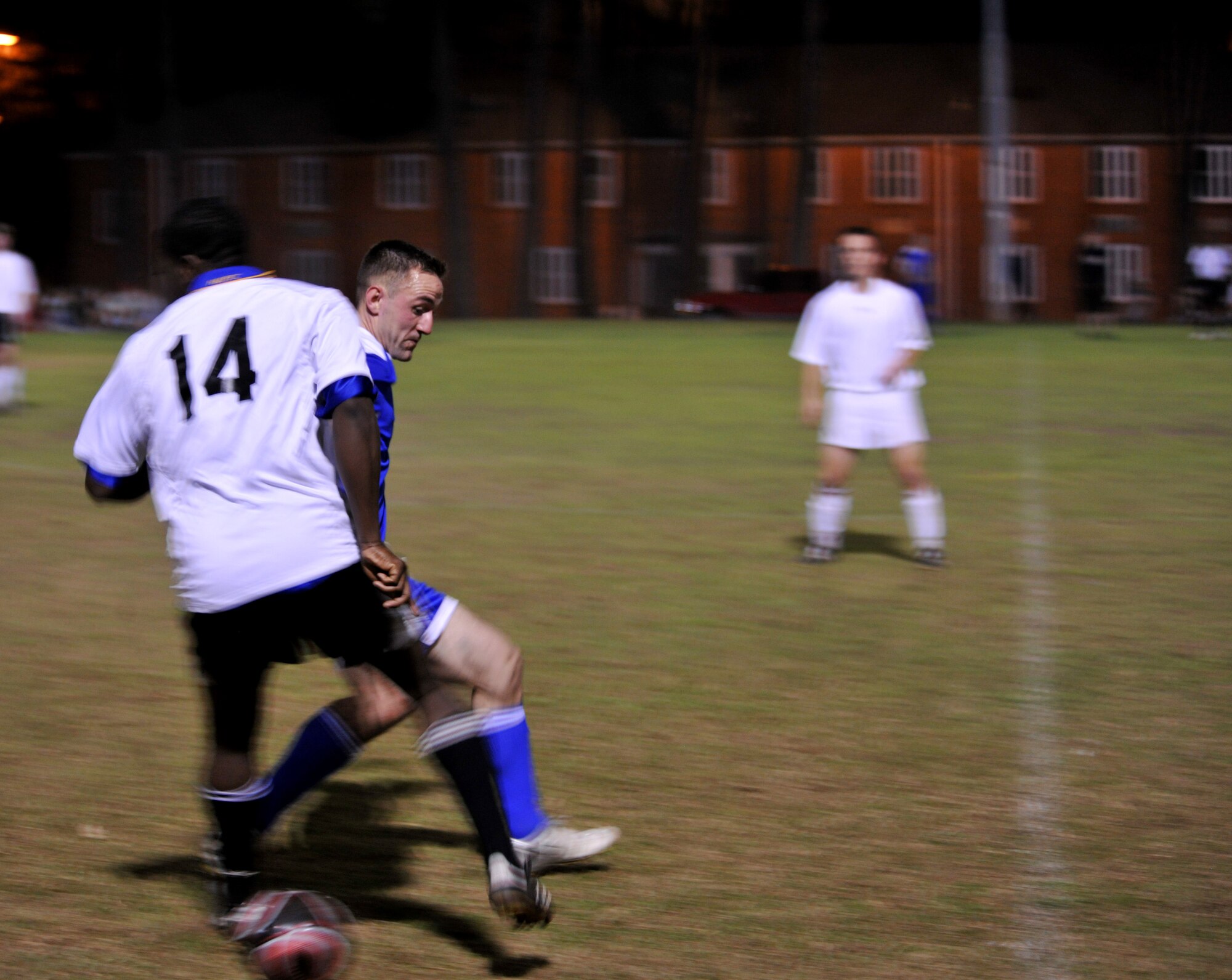 VALDOSTA, Ga.-- Joseph Foster, player from Moody’s soccer team, tries to steal the ball from a defender for the Valdosta State University Blazers soccer team during a rematch Feb. 22. Even with a solid start to the game and a strong performance from team Moody, VSU still came out on top with a 4-1 victory. (U.S. Air Force photo/Airman 1st Class Joshua Green)(RELEASED)
