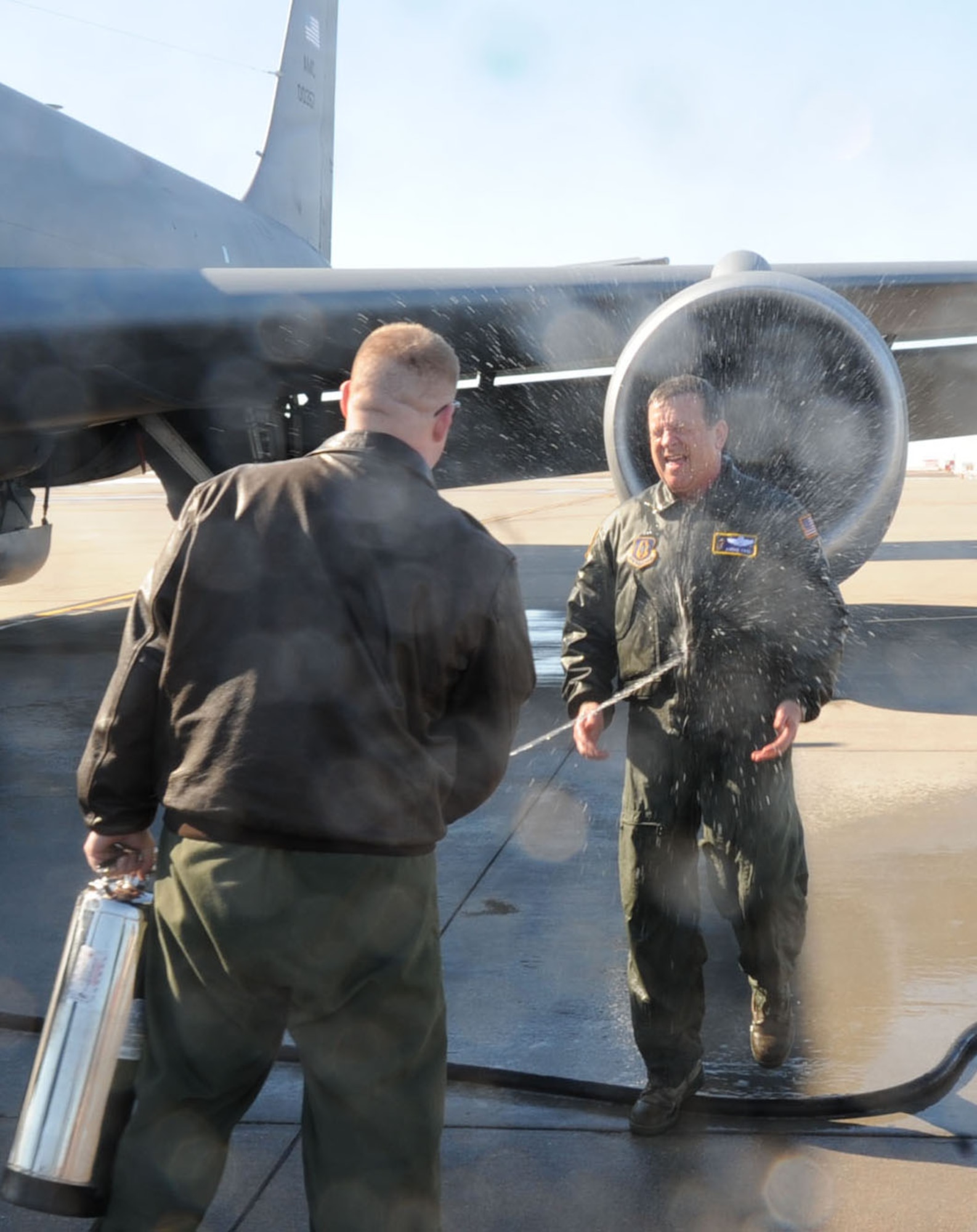 Col. Edsel A. "Archie" Frye gets sprayed following his 'finiflight'. Colonel Frye will depart the 931st ARG, Feb. 27 to take over 22nd Air Force Detachment 1, a C-130 Flight Training Unit at Little Rock AFB, Arkansas. 